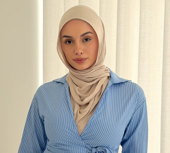 How do you tie a wrap shirt so it doesn’t loosen during the day?