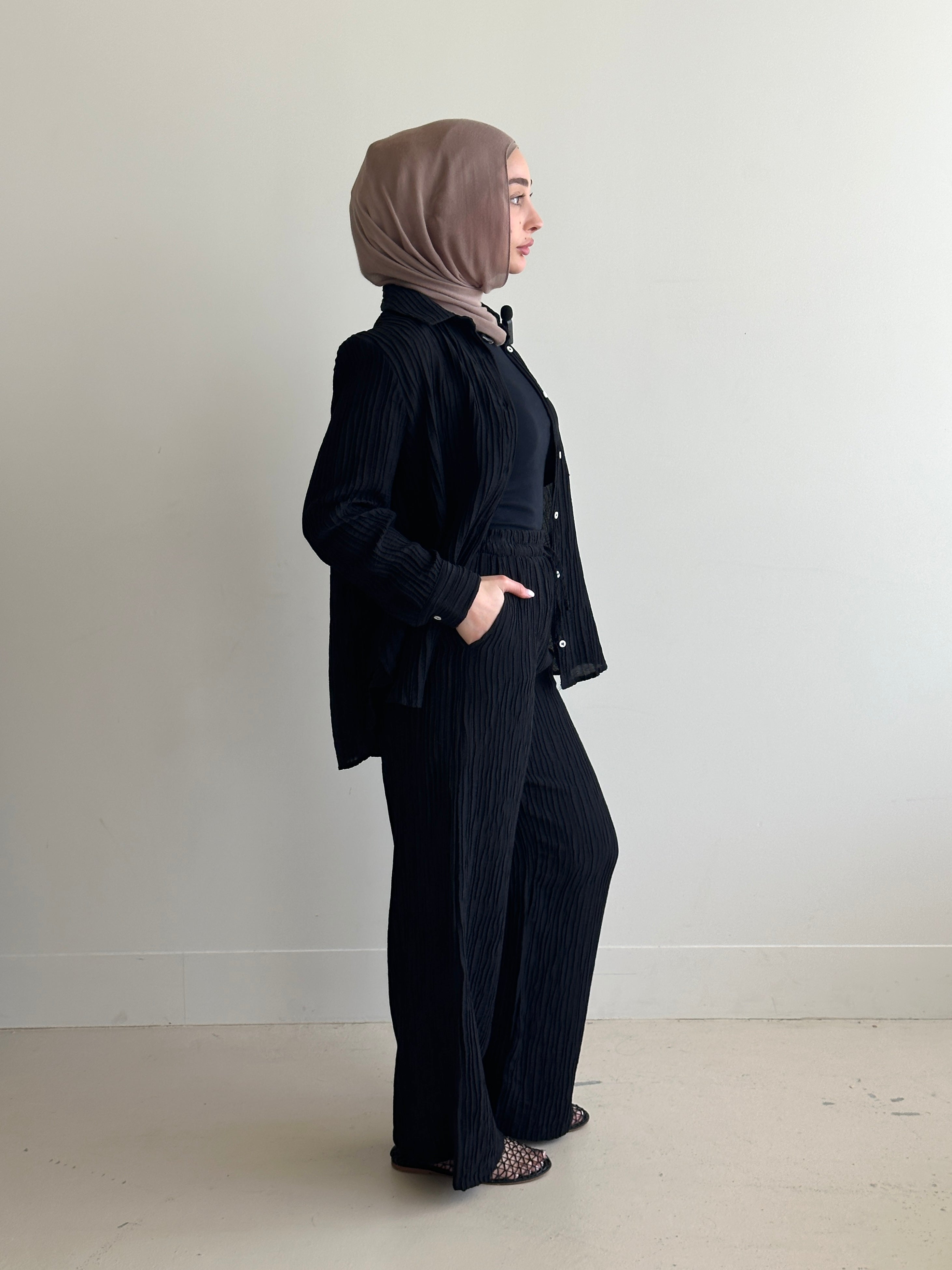 women's 2 piece modest fashion summer set, co-ord includes button up long sleeve shirt with matching loose pant. fabrication is crinkled, lightweight and breathable for summer. can wear it everyday, to work, brunch, picnic and can be transformed to a night outfit to wear with heels and dress it more up for dinner dates.