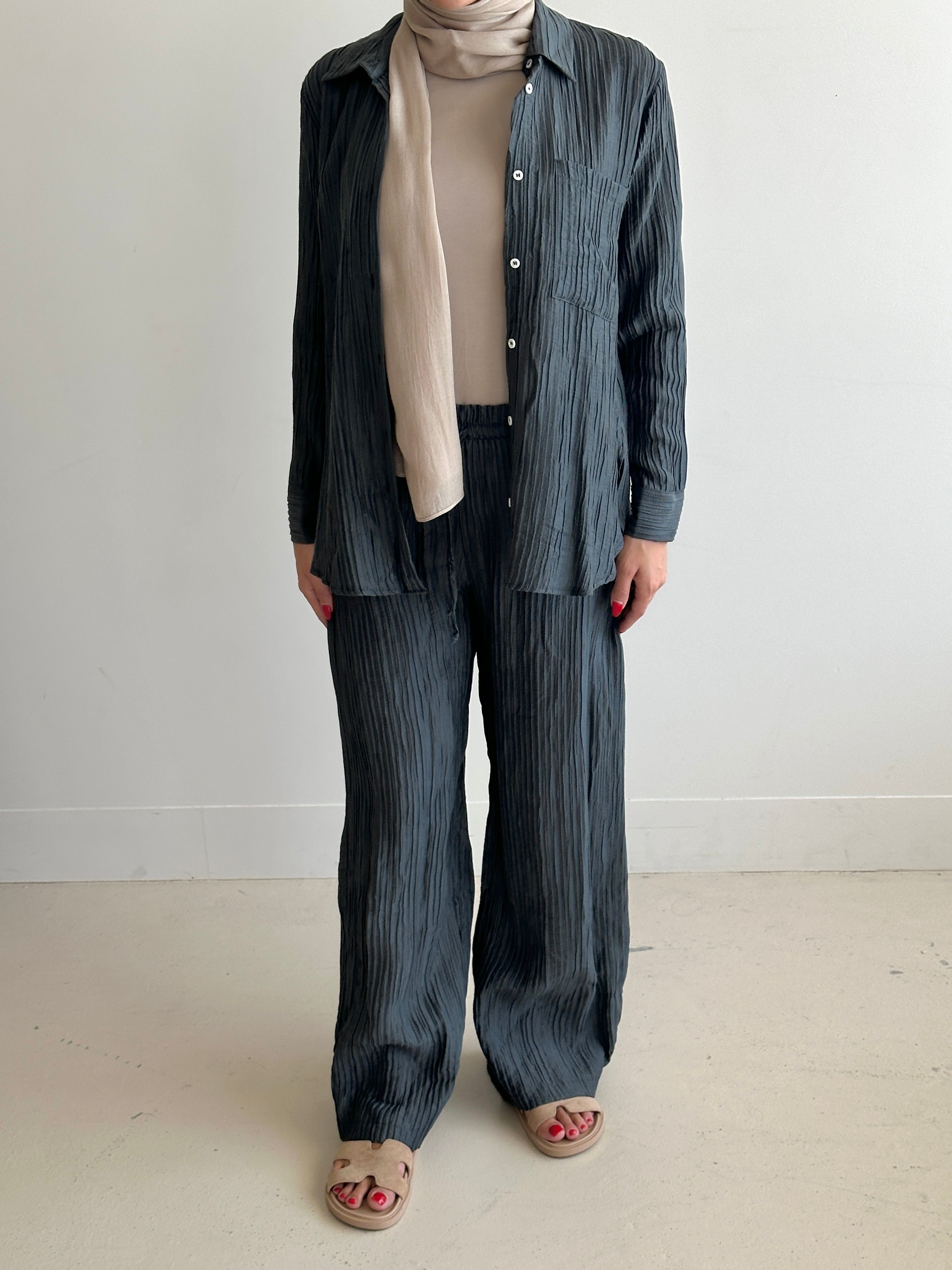 women's 2 piece modest fashion summer set, co-ord includes button up long sleeve shirt with matching loose pant. fabrication is crinkled, lightweight and breathable for summer. can wear it everyday, to work, brunch, picnic and can be transformed to a night outfit to wear with heels and dress it more up for dinner dates.