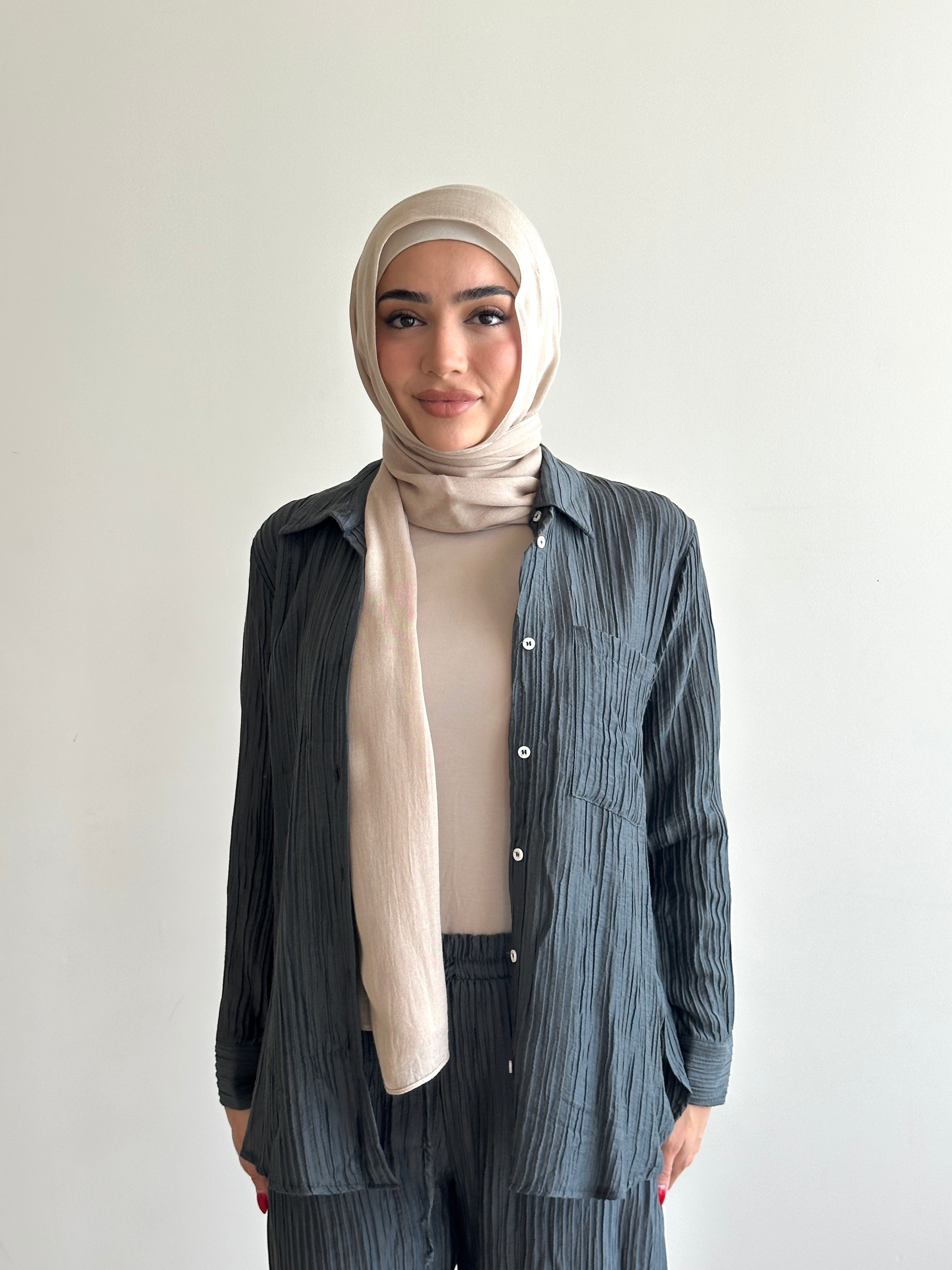 women's 2 piece modest fashion summer set, co-ord includes button up long sleeve shirt with matching loose pant. fabrication is crinkled, lightweight and breathable for summer. can wear it everyday, to work, brunch, picnic and can be transformed to a night outfit to wear with heels and dress it more up for dinner dates.