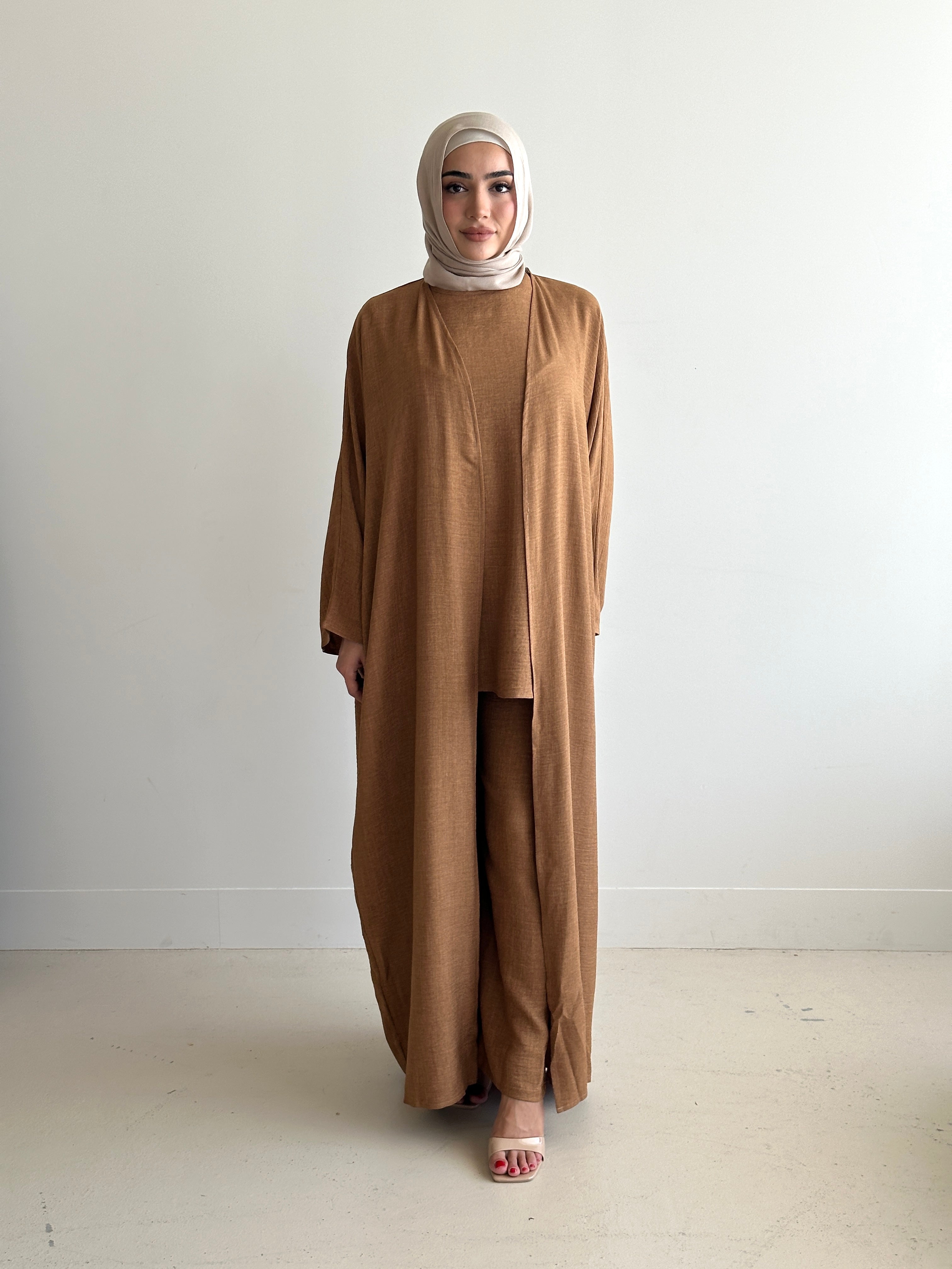 women's 3 piece set. includes loose pant with sleeveless top and full length kimono. available in 4 colours. set is lightweight, loose, comfortable, versatile, modest with full coverage and is for hijabi muslim women. Beautiful to wear dressed down or up- brunch, picnic, gatherings, dinners, engagement, day/night event and graduations.