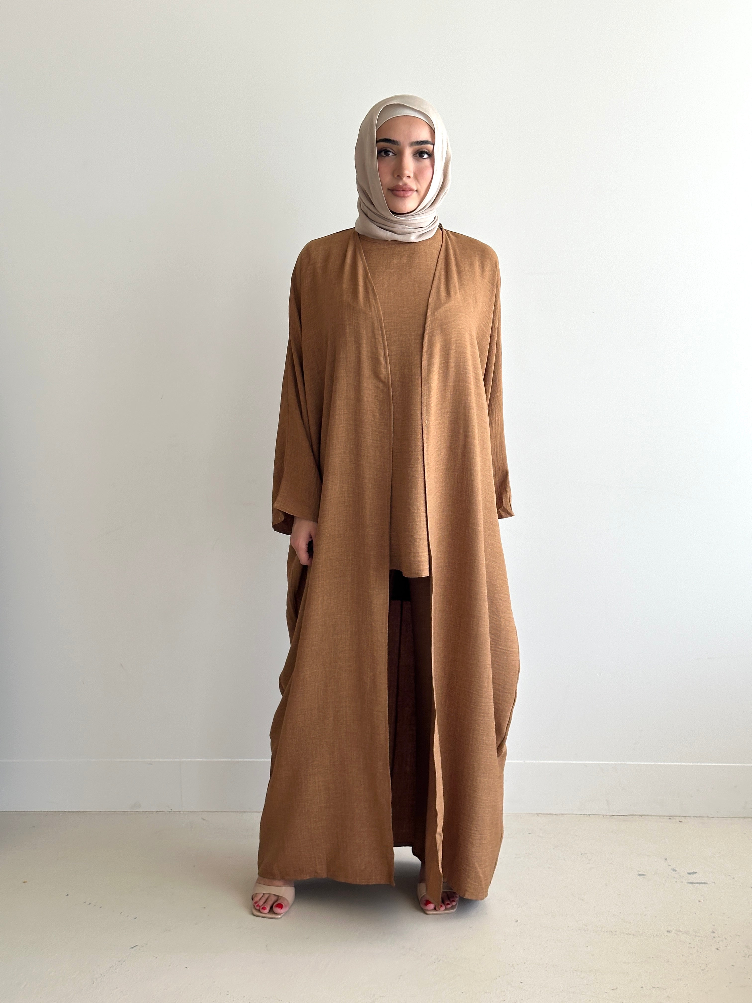 women's 3 piece set. includes loose pant with sleeveless top and full length kimono. available in 4 colours. set is lightweight, loose, comfortable, versatile, modest with full coverage and is for hijabi muslim women. Beautiful to wear dressed down or up- brunch, picnic, gatherings, dinners, engagement, day/night event and graduations.
