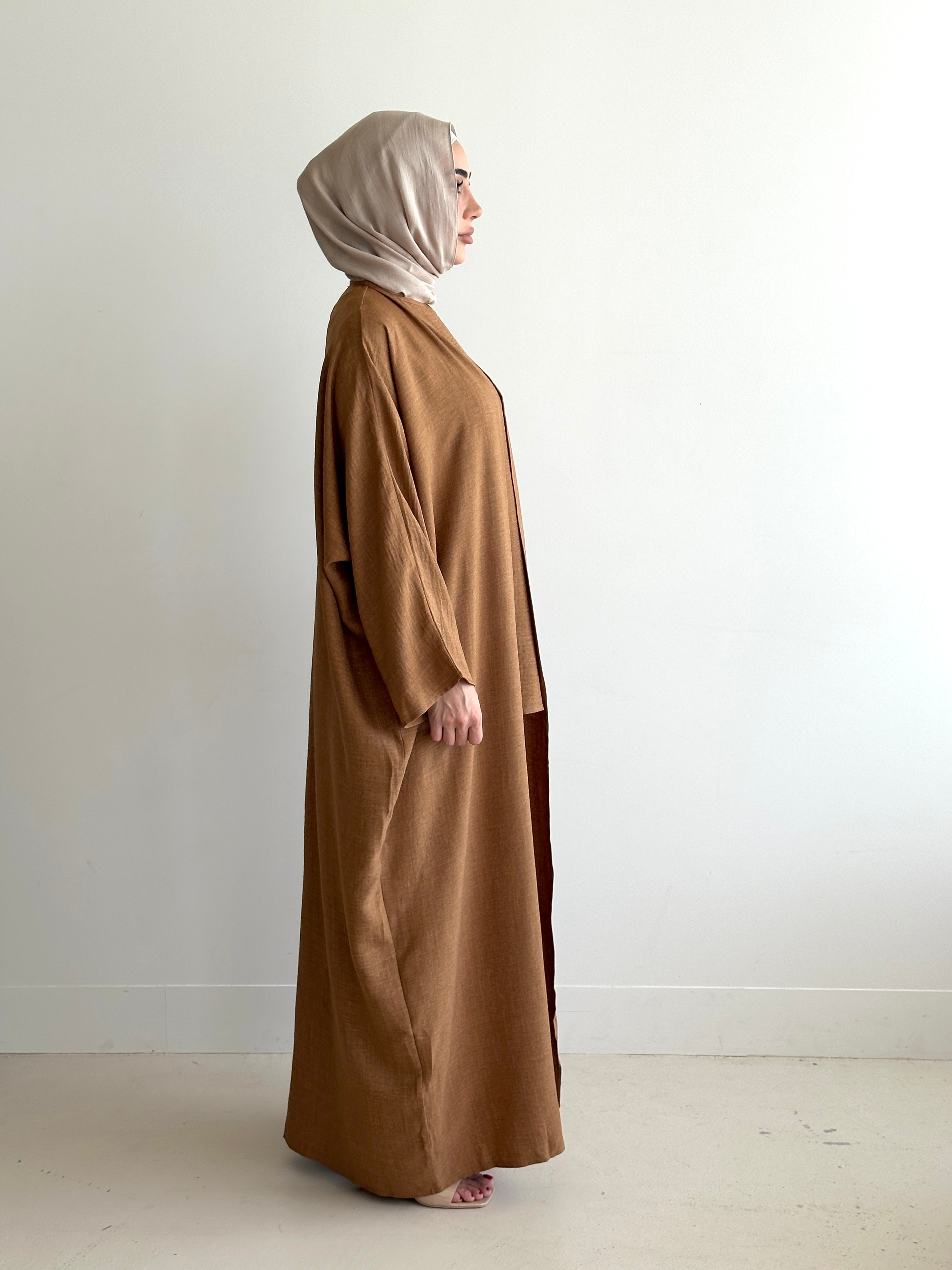 women's 3 piece set. includes loose pant with sleeveless top and full length kimono. available in 4 colours. set is lightweight, loose, comfortable, versatile, modest with full coverage and is for hijabi muslim women. Beautiful to wear dressed down or up- brunch, picnic, gatherings, dinners, engagement, day/night event and graduations.