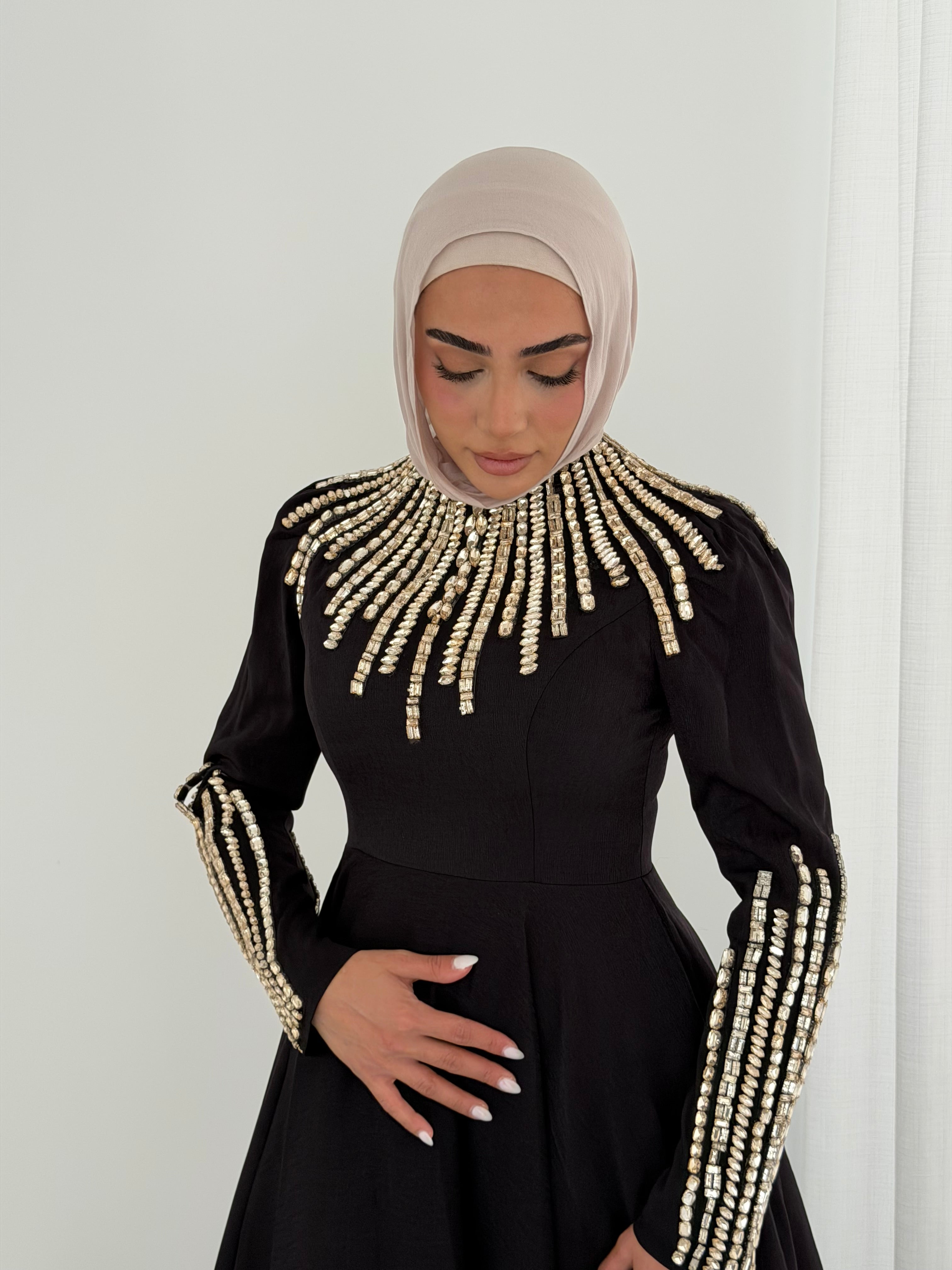 women's formal dress- maxi, full length with long sleeves and offers modest coverage with gold embellishment. Suitable to wear for occasions, engagement, wedding, formals etc.