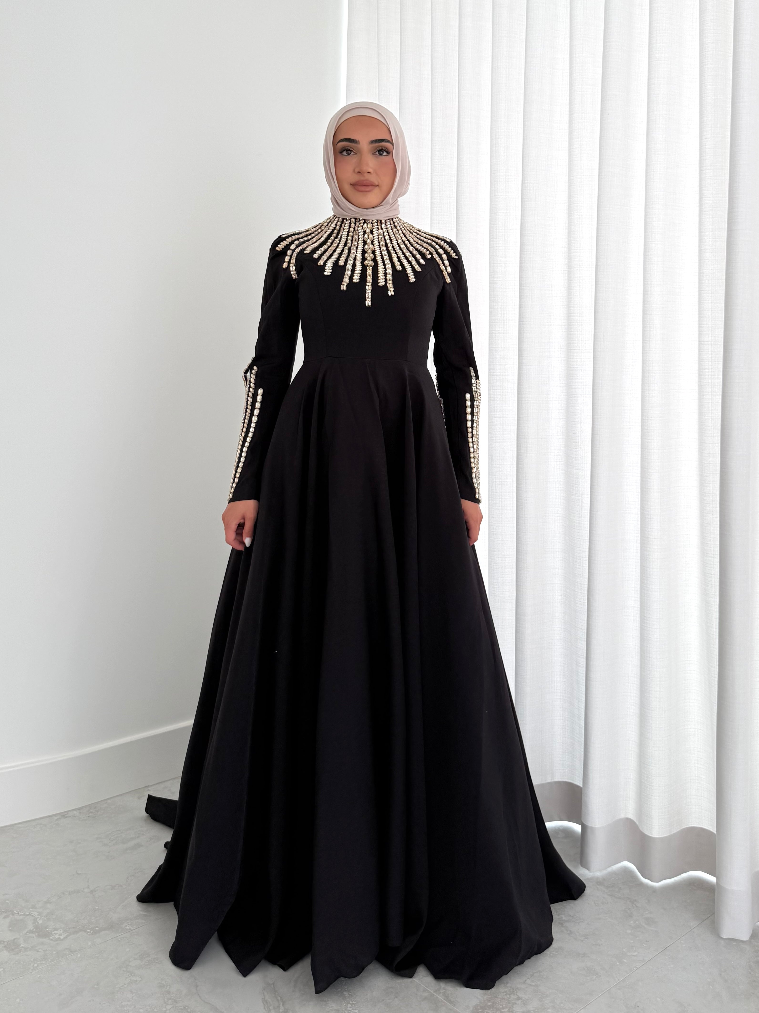 women's formal dress- maxi, full length with long sleeves and offers modest coverage with gold embellishment. Suitable to wear for occasions, engagement, wedding, formals etc.