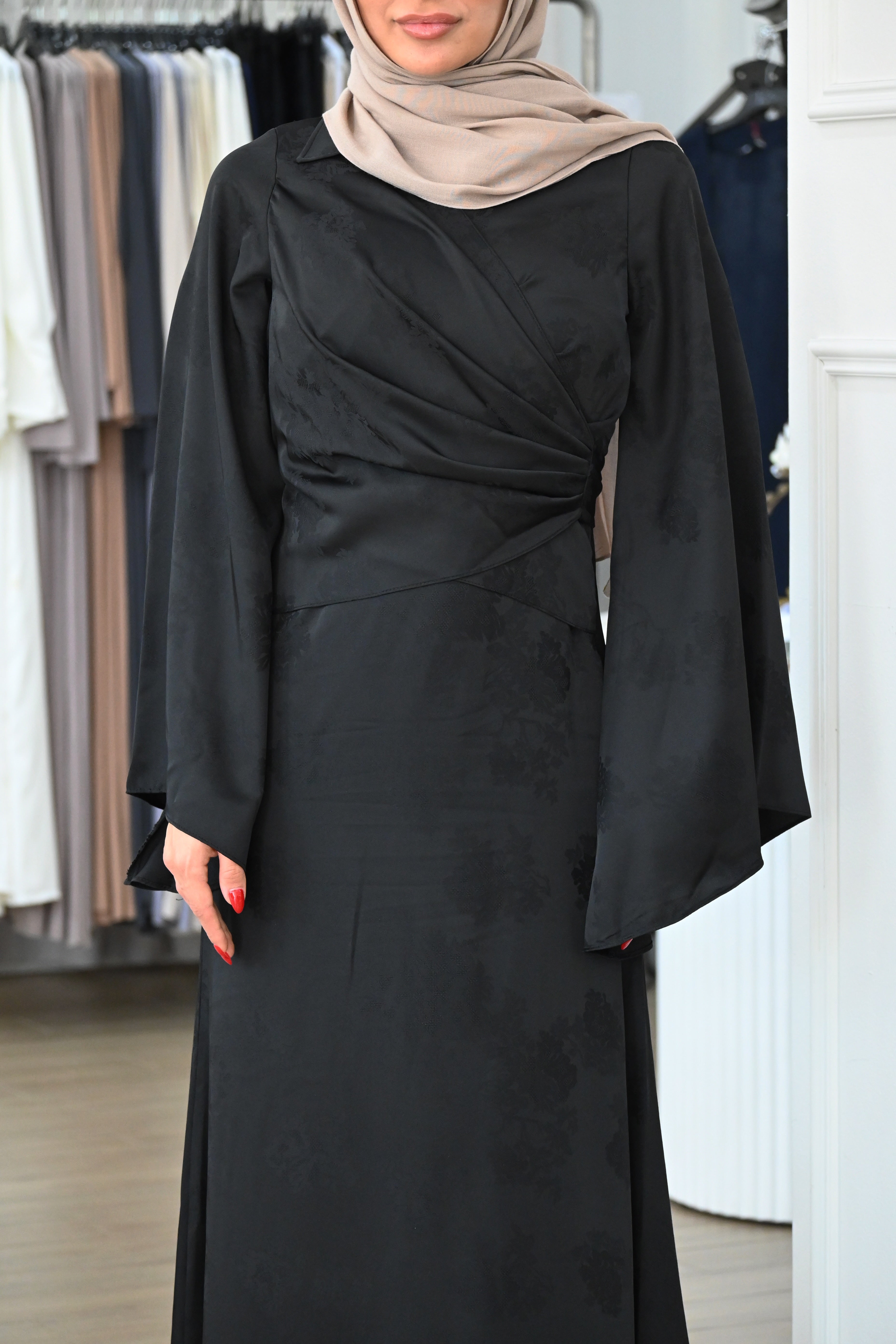 Cross over bodice creates a soft wrap effect that cinches gently at the waist, while the flowing A-line skirt offers graceful movement with every step.