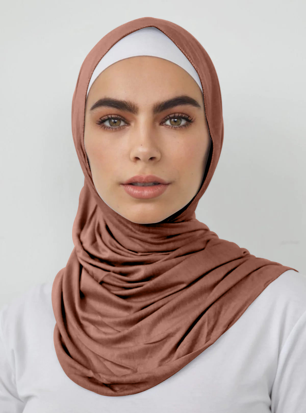 Signature jersey scarf made from soft, stretchy cotton with an extended length for easy wrapping and a secure, comfortable fit around the head.