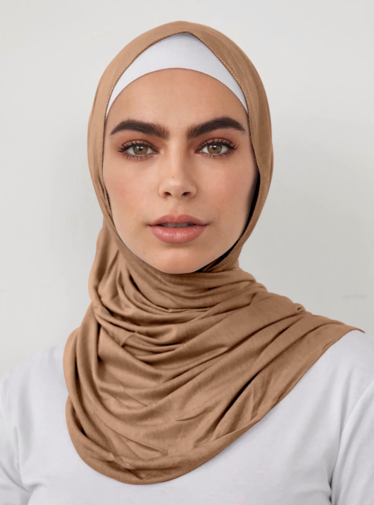 Signature jersey scarf made from soft, stretchy cotton with an extended length for easy wrapping and a secure, comfortable fit around the head.