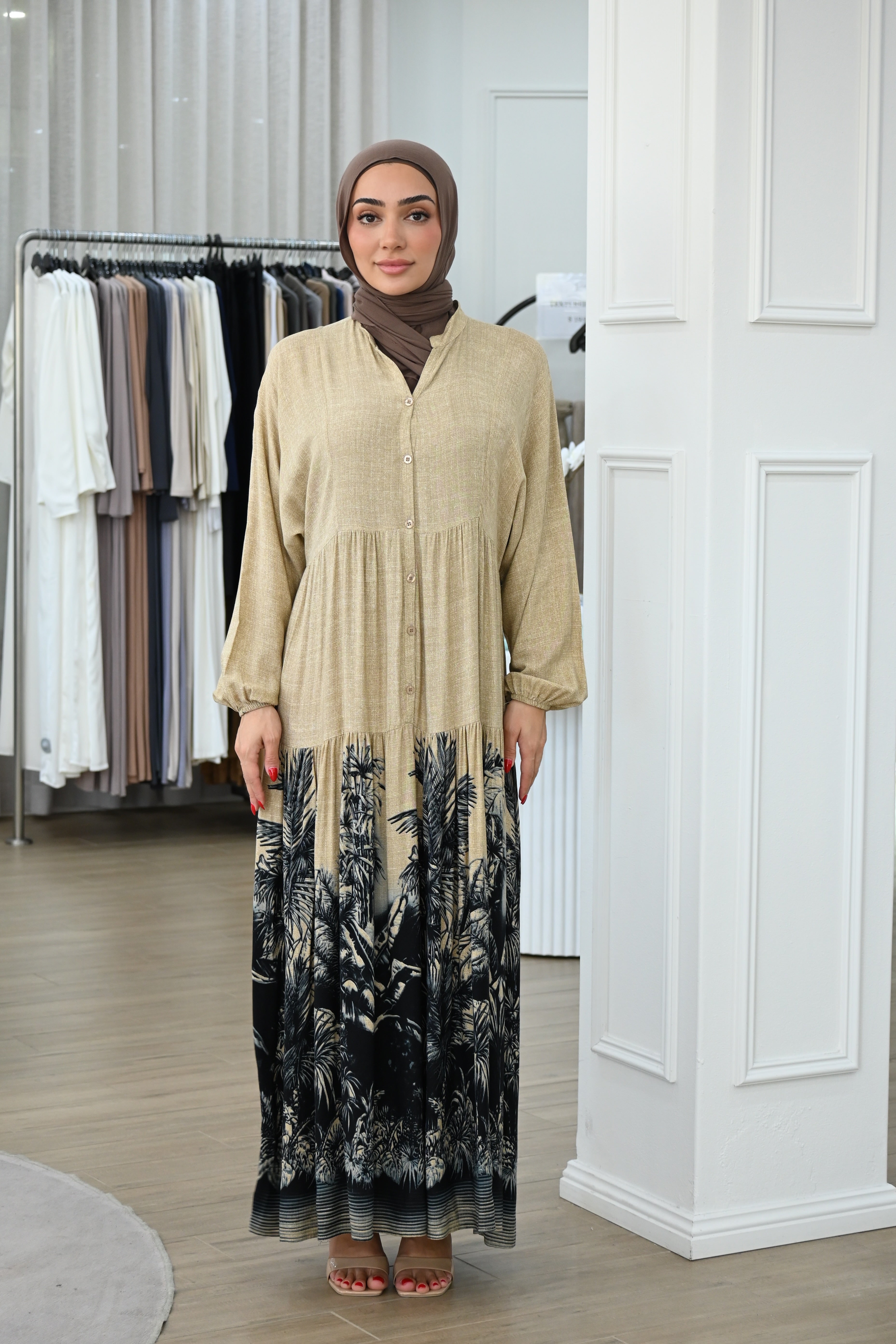 Effortlessly elegant and designed for everyday comfort, this cotton dress features a relaxed silhouette that flows beautifully with movement. Crafted from breathable cotton, it offers a lightweight feel ideal for warm days while maintaining a modest, refined look.