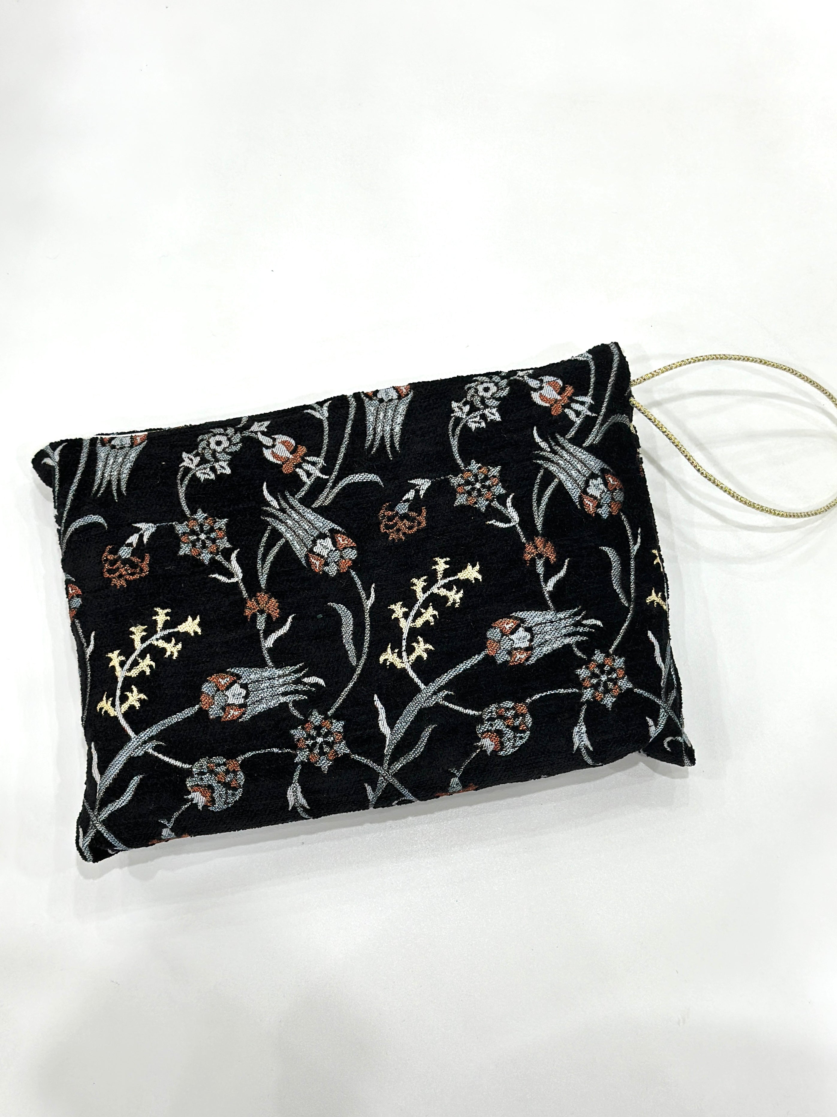 Embroidered Travel Prayer Mat with delicate embroidery, lightweight and portable for use on the go. Ideal for handbags, cars, work totes, or travel, providing a practical and elegant solution for performing salah anywhere.