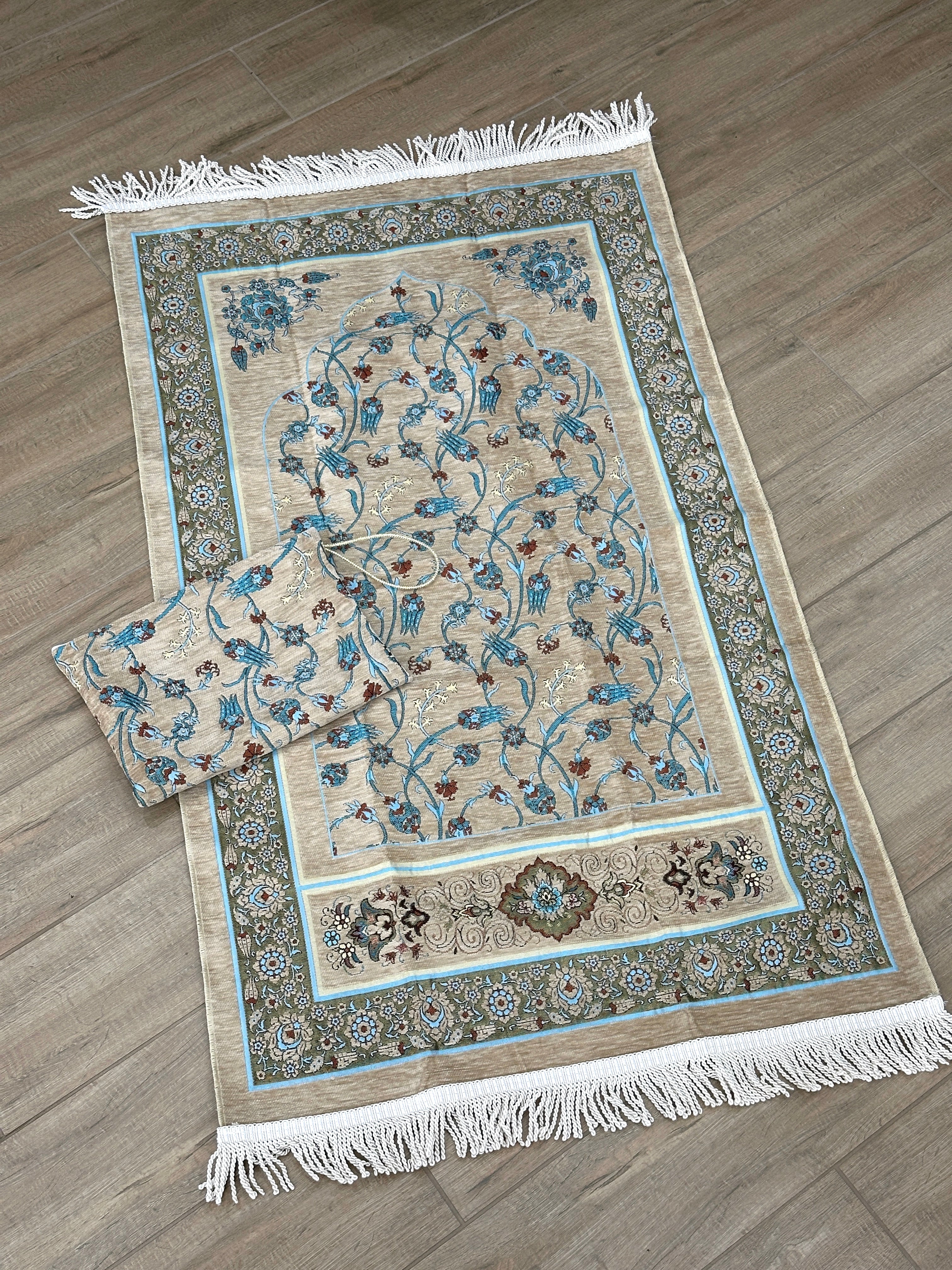 Embroidered Travel Prayer Mat with delicate embroidery, lightweight and portable for use on the go. Ideal for handbags, cars, work totes, or travel, providing a practical and elegant solution for performing salah anywhere.