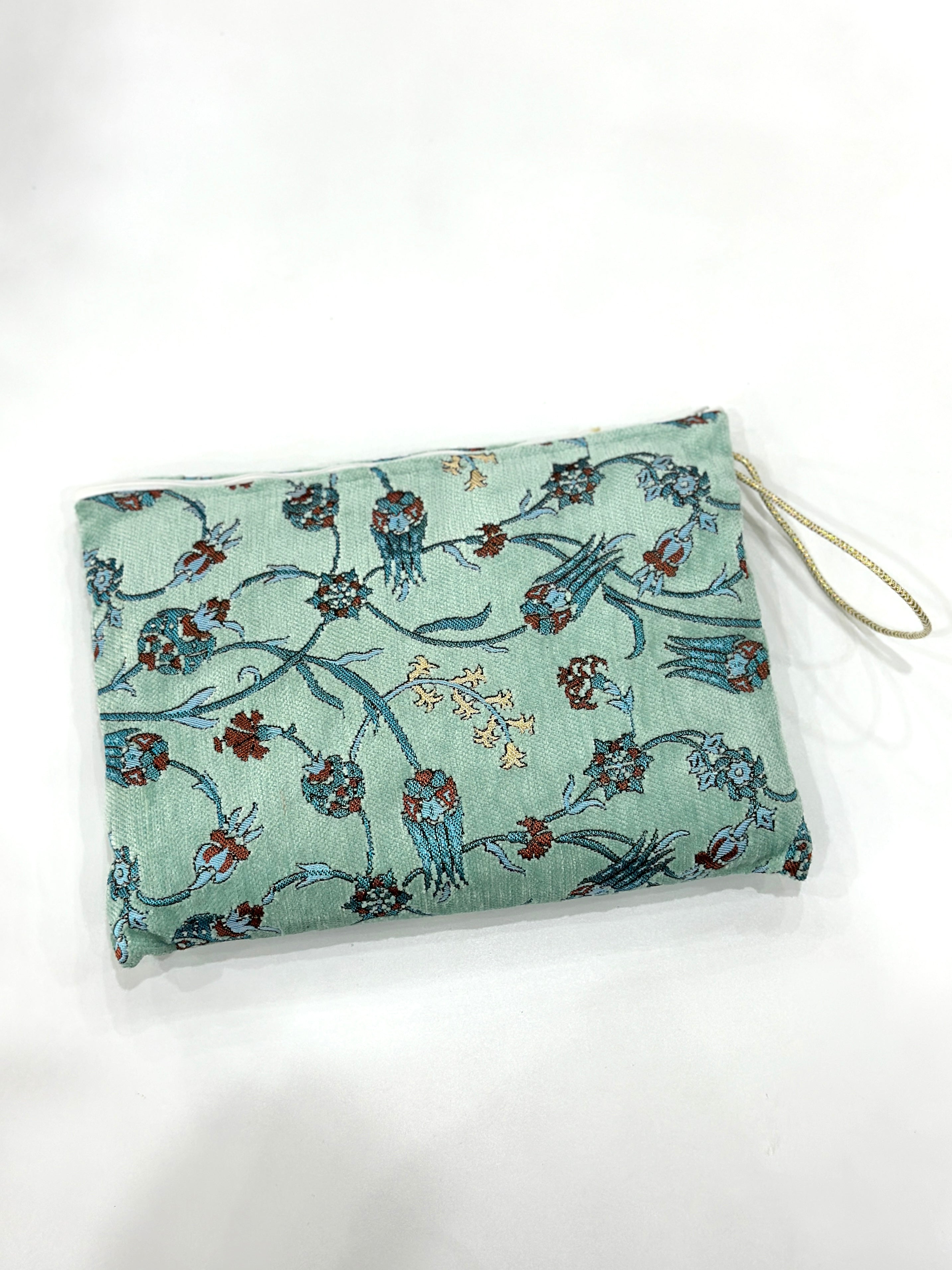 Embroidered Travel Prayer Mat with delicate embroidery, lightweight and portable for use on the go. Ideal for handbags, cars, work totes, or travel, providing a practical and elegant solution for performing salah anywhere.