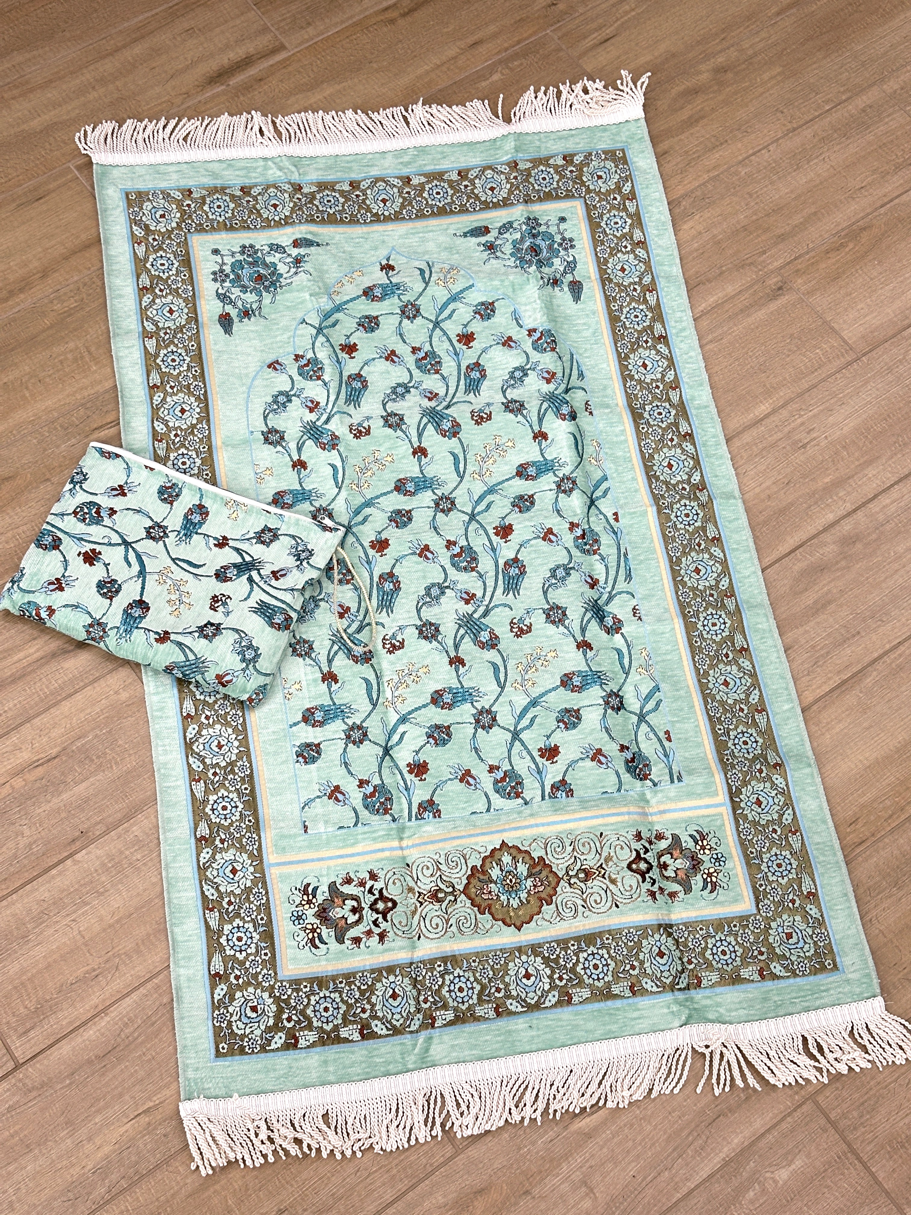 Embroidered Travel Prayer Mat with delicate embroidery, lightweight and portable for use on the go. Ideal for handbags, cars, work totes, or travel, providing a practical and elegant solution for performing salah anywhere.
