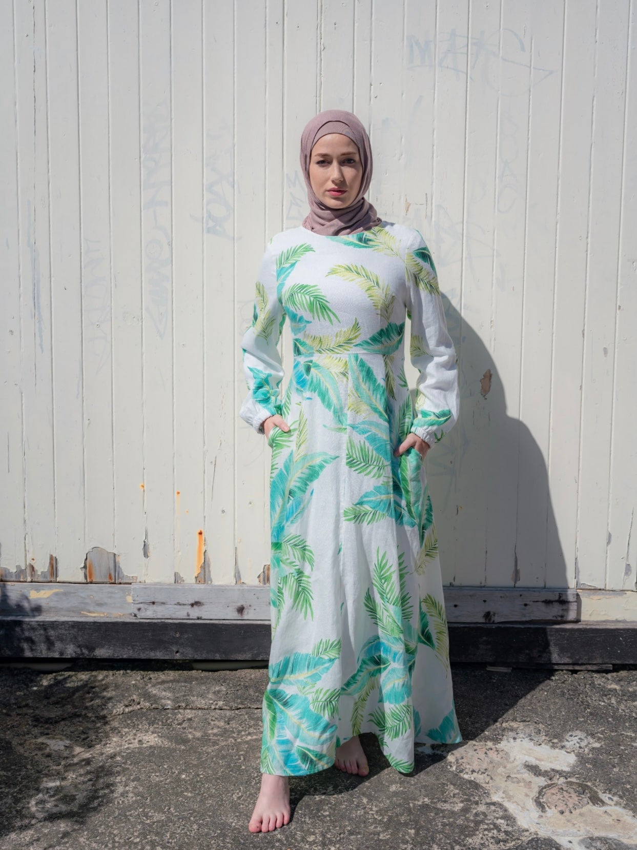 Made with bright and uplifting hues, the EVERGREEN ESCAPE DRESS, is the perfect number for your next holiday. Like our signature Amira Linen Dress, except this one features a tropical inspired leafy print.