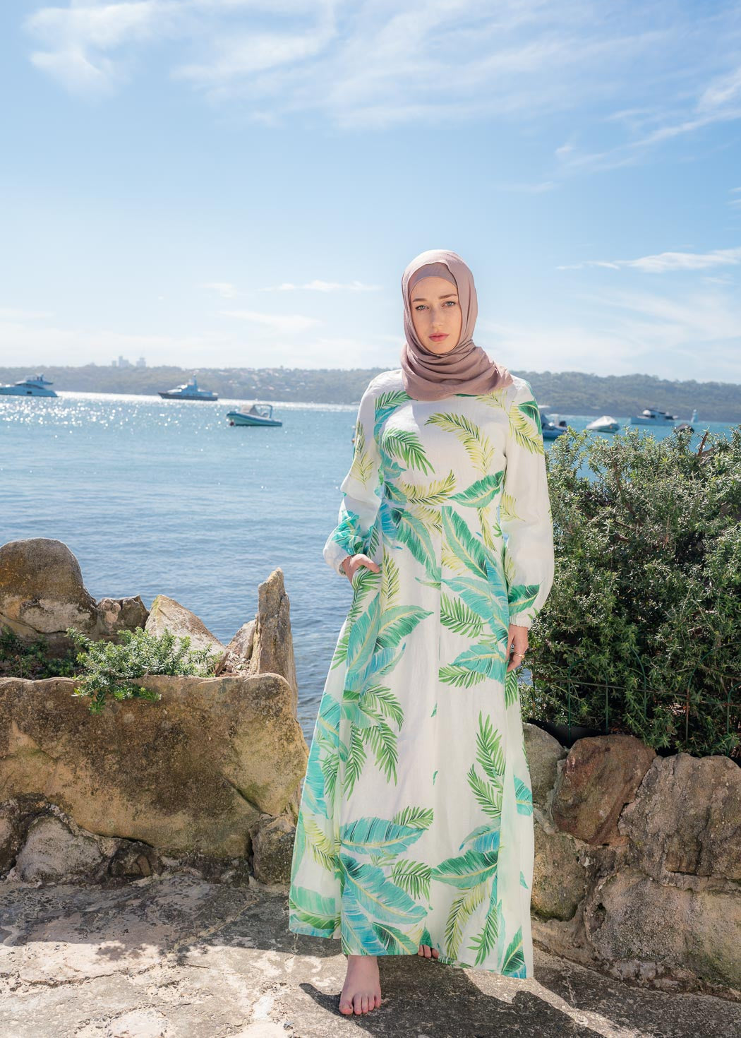 Made with bright and uplifting hues, the EVERGREEN ESCAPE DRESS, is the perfect number for your next holiday. Like our signature Amira Linen Dress, except this one features a tropical inspired leafy print.