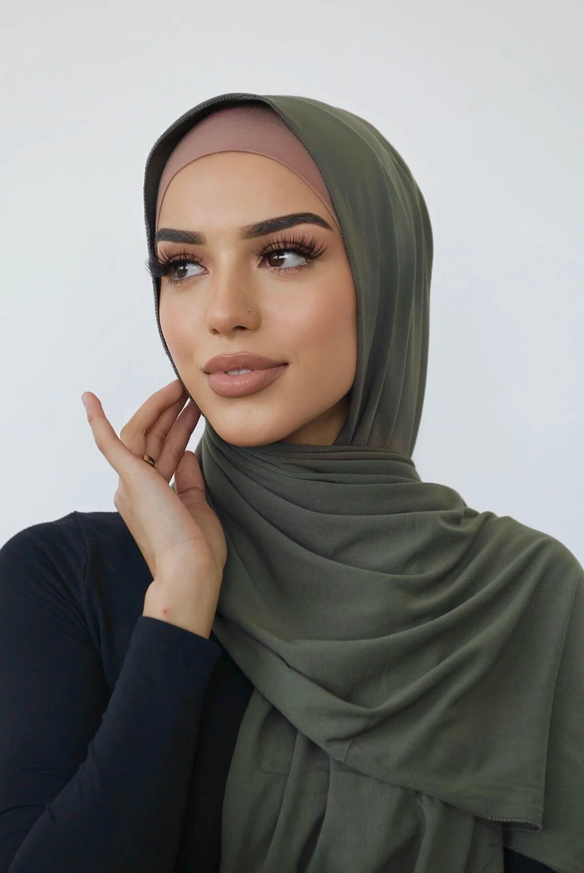 Signature jersey scarf made from soft, stretchy cotton with an extended length for easy wrapping and a secure, comfortable fit around the head.