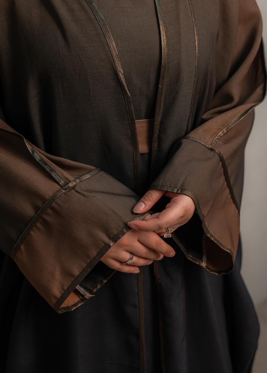 The stunning kaftan dress and tonal dress underlay provide versatility and comfort, while the lace tie neckline adds a feminine touch. Perfect for social occasions and functions, this set will be on high rotation in your wardrobe.