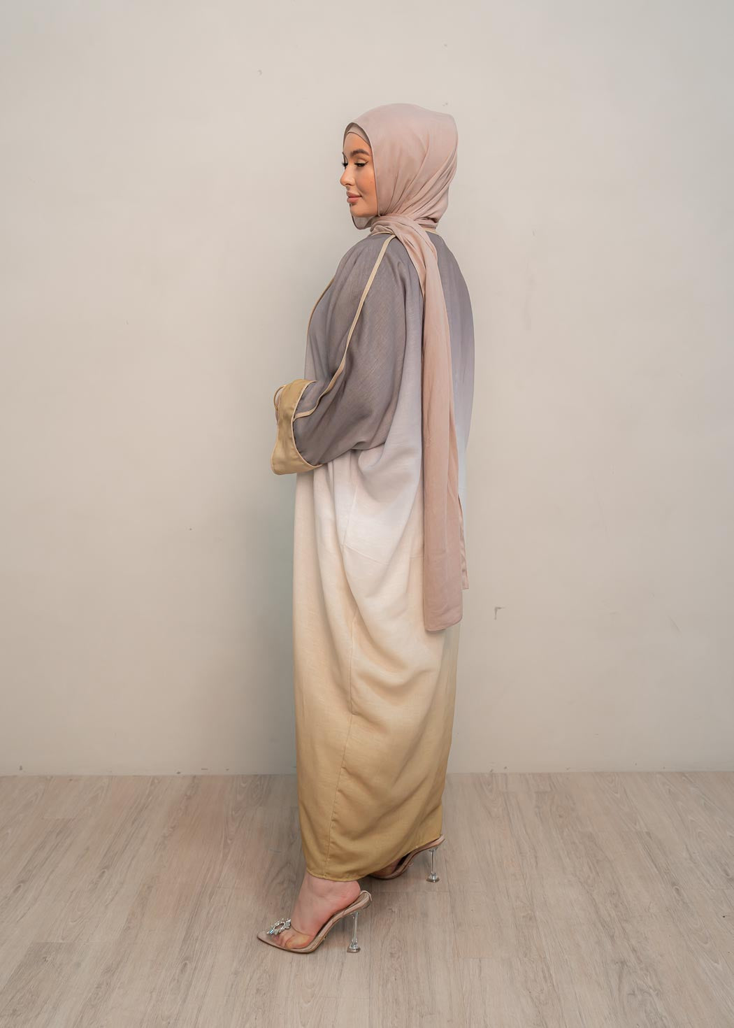 The stunning kaftan dress and tonal dress underlay provide versatility and comfort, while the lace tie neckline adds a feminine touch. Perfect for social occasions and functions, this set will be on high rotation in your wardrobe.