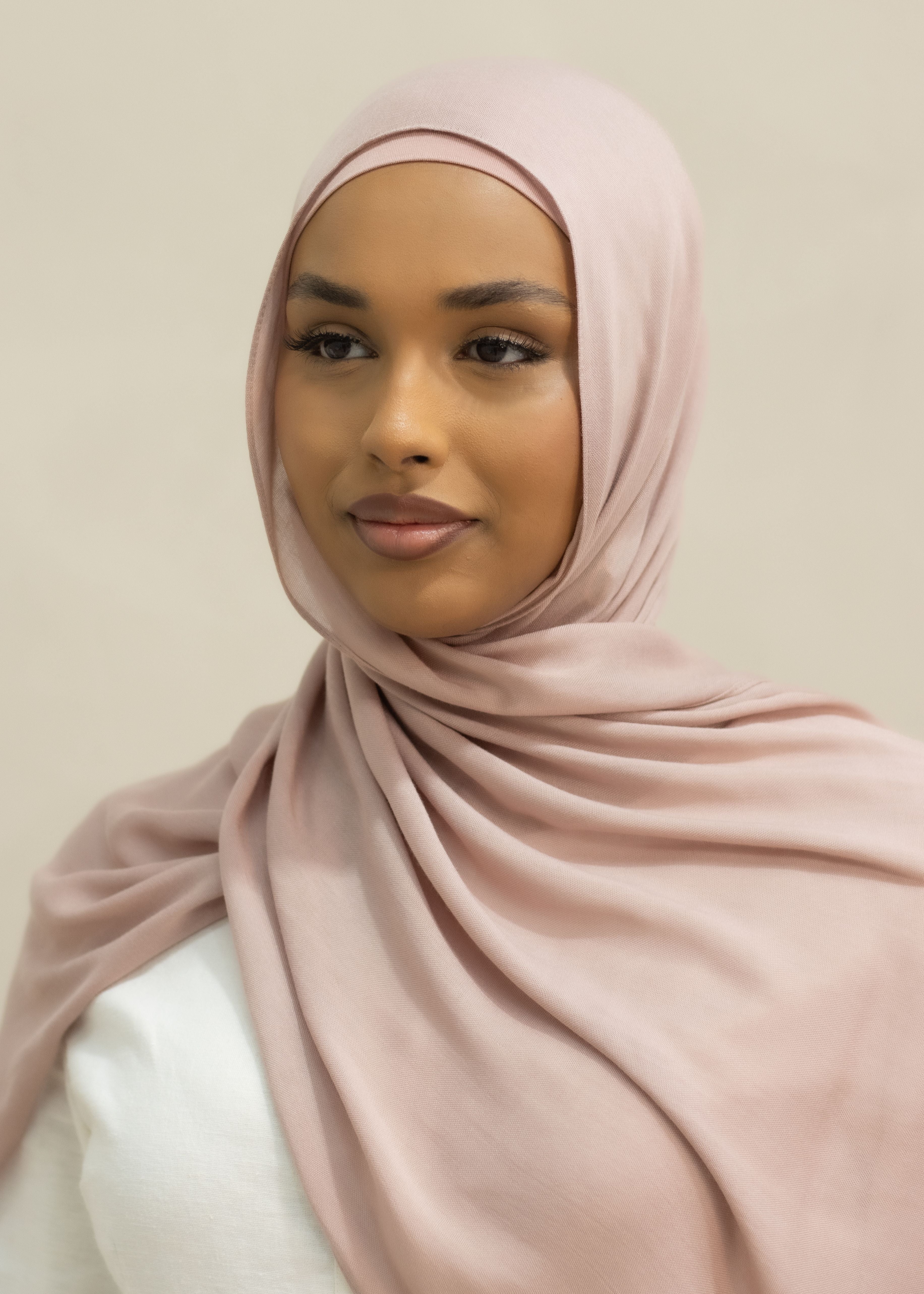 The material is designed to be almost non-see through, offering excellent coverage while maintaining a lightweight, breathable feel. Perfect for those seeking a blend of style, comfort and modesty.