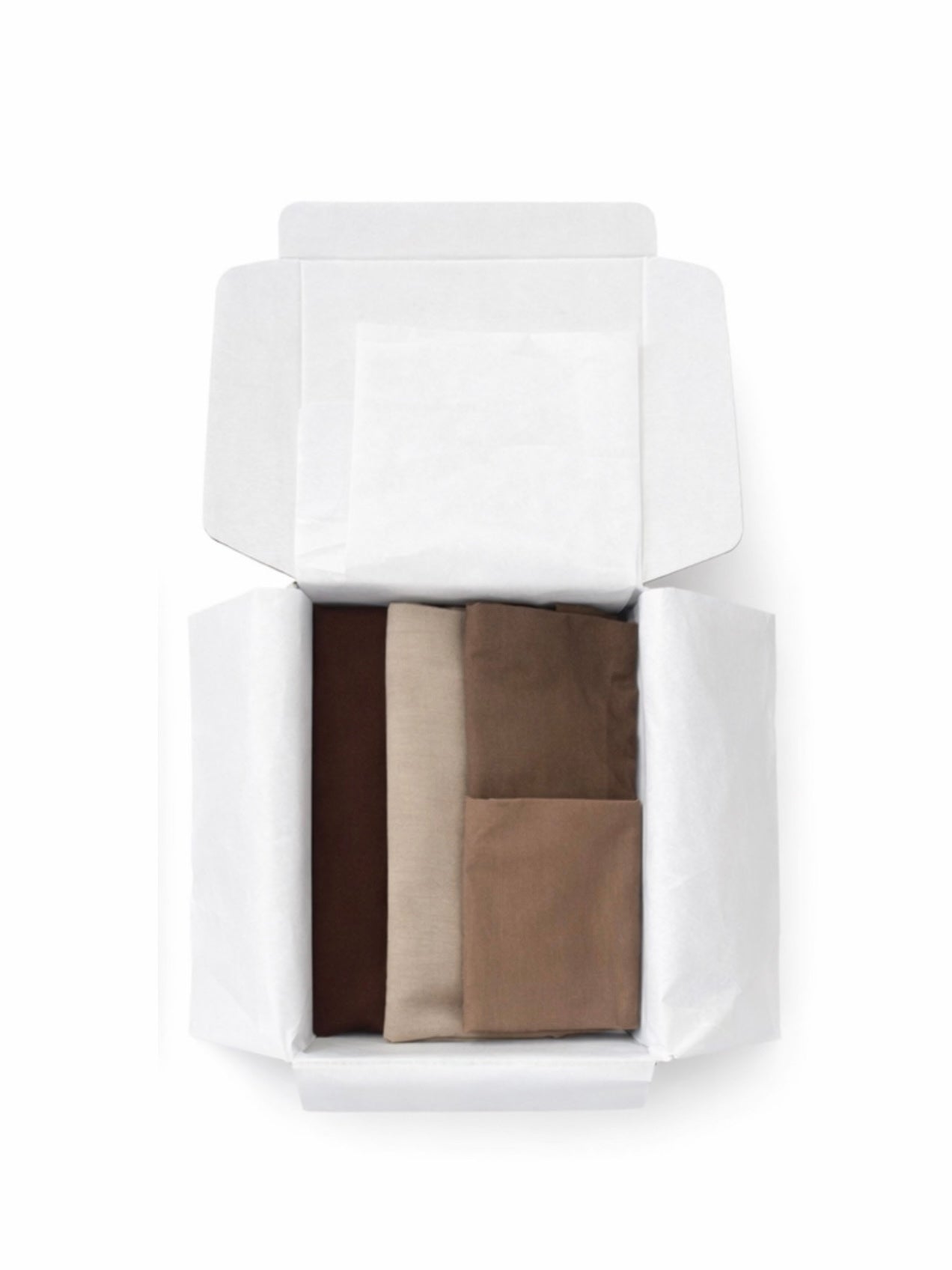 Hijab Gift Box with 2 long Modal hijabs in cardamom and sesame shades, paired with 2 caps. Ideal gift for Mother's Day, Eid, or someone new to wearing the hijab.