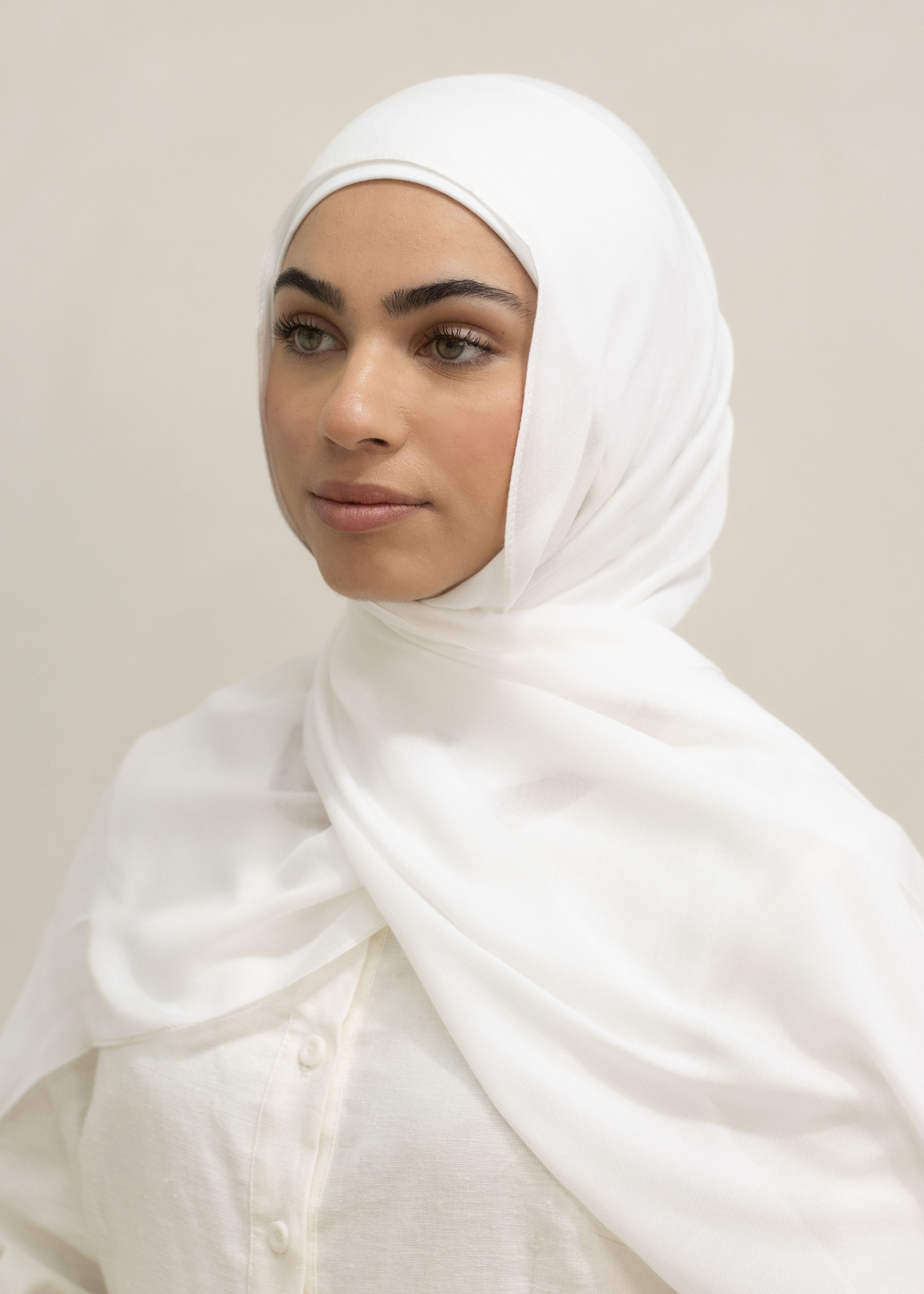 Modal Hijab & Cotton Cap Set featuring a soft, lightweight modal hijab with an elegant drape and near opaque coverage, paired with a comfortable cotton undercap for secure, breathable all-day wear.