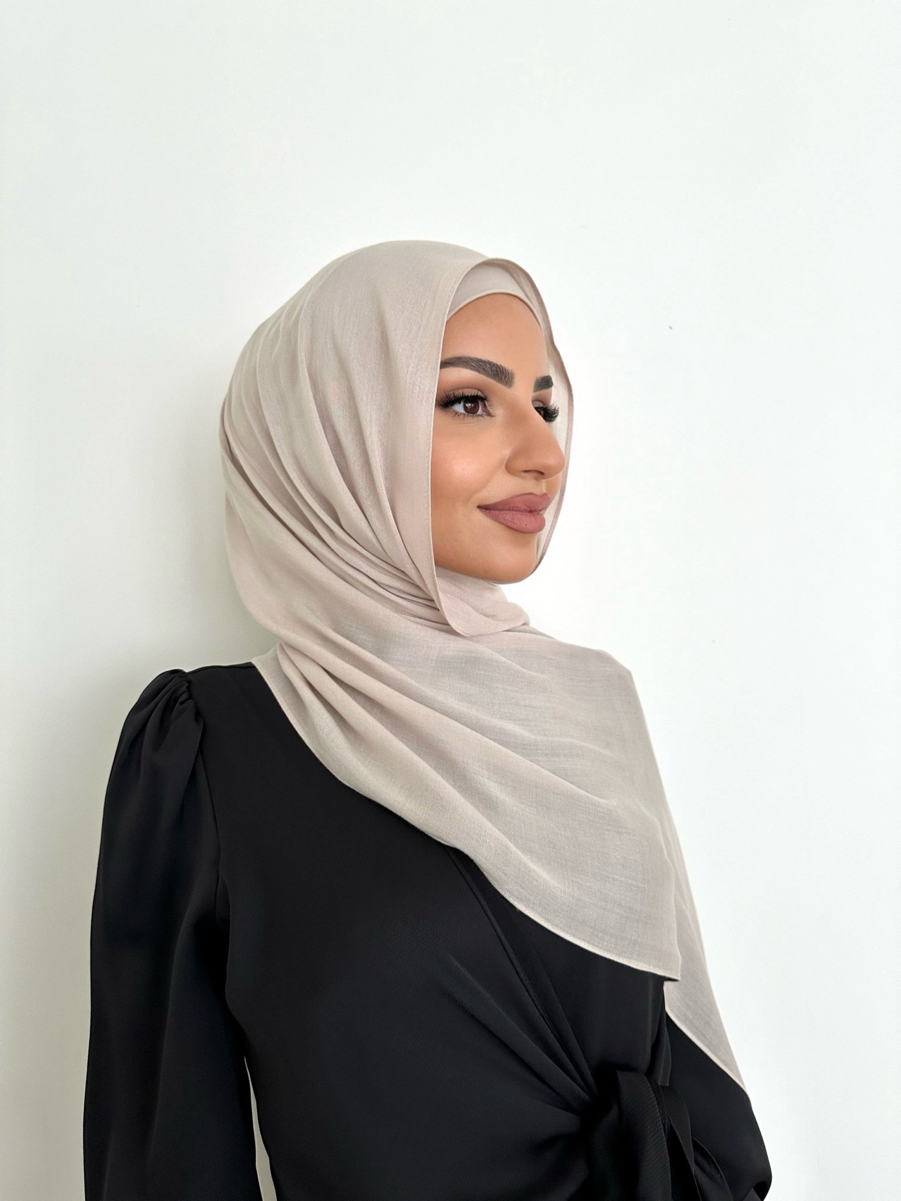 The material is designed to be almost non-see through, offering excellent coverage while maintaining a lightweight, breathable feel. Perfect for those seeking a blend of style, comfort and modesty.