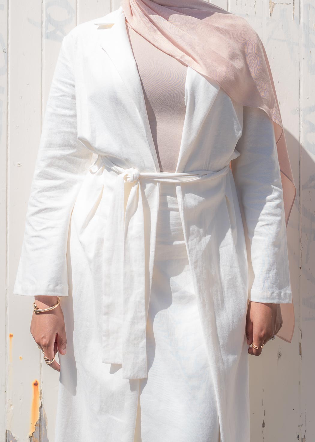 Two-piece set featuring a maxi-length duster coat and elastic-waist wide-leg skirt, designed in a relaxed, throw-on style for comfortable, effortless wear across seasons.