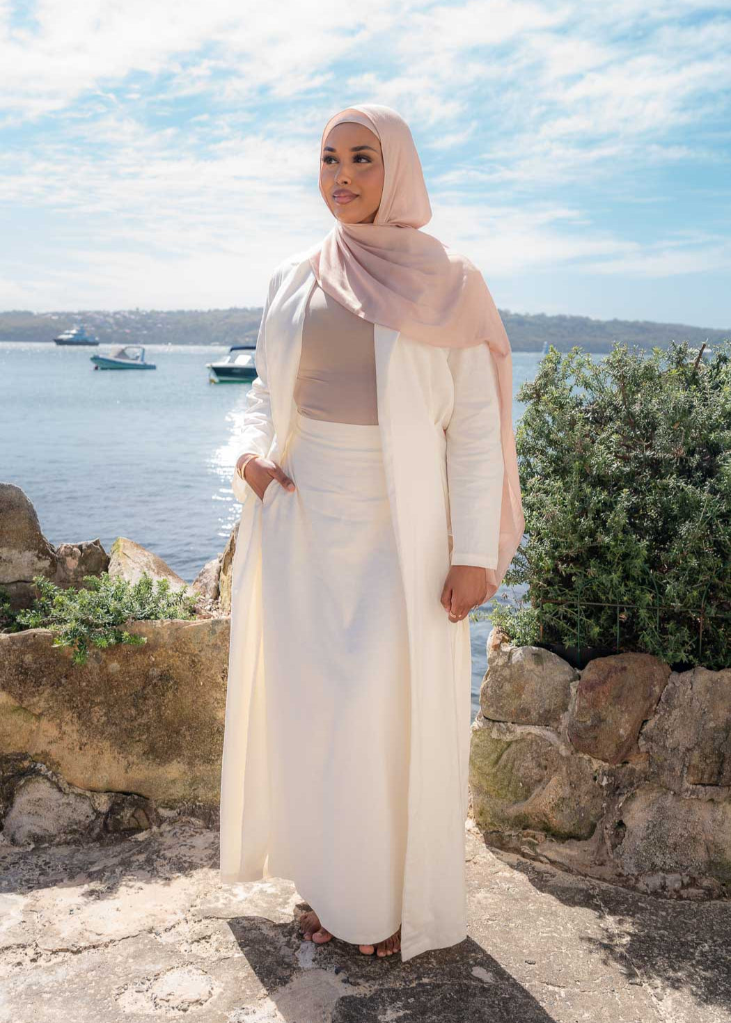 Two-piece set featuring a maxi-length duster coat and elastic-waist wide-leg skirt, designed in a relaxed, throw-on style for comfortable, effortless wear across seasons.