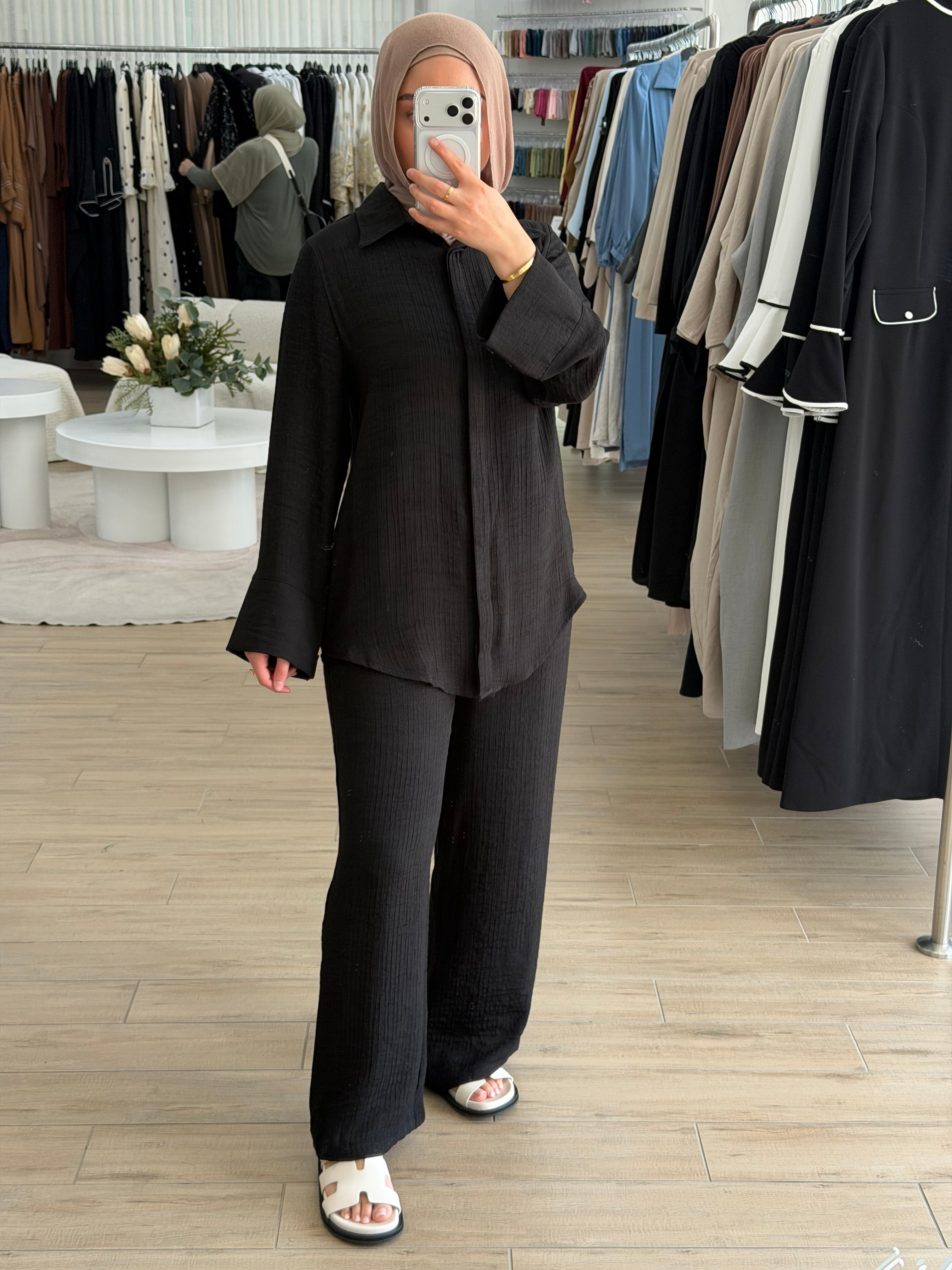 A beautifully coordinated two-piece outfit designed for simple sophistication. This set includes a relaxed-fit top and matching pants, crafted to make refined modest dressing easier than ever.