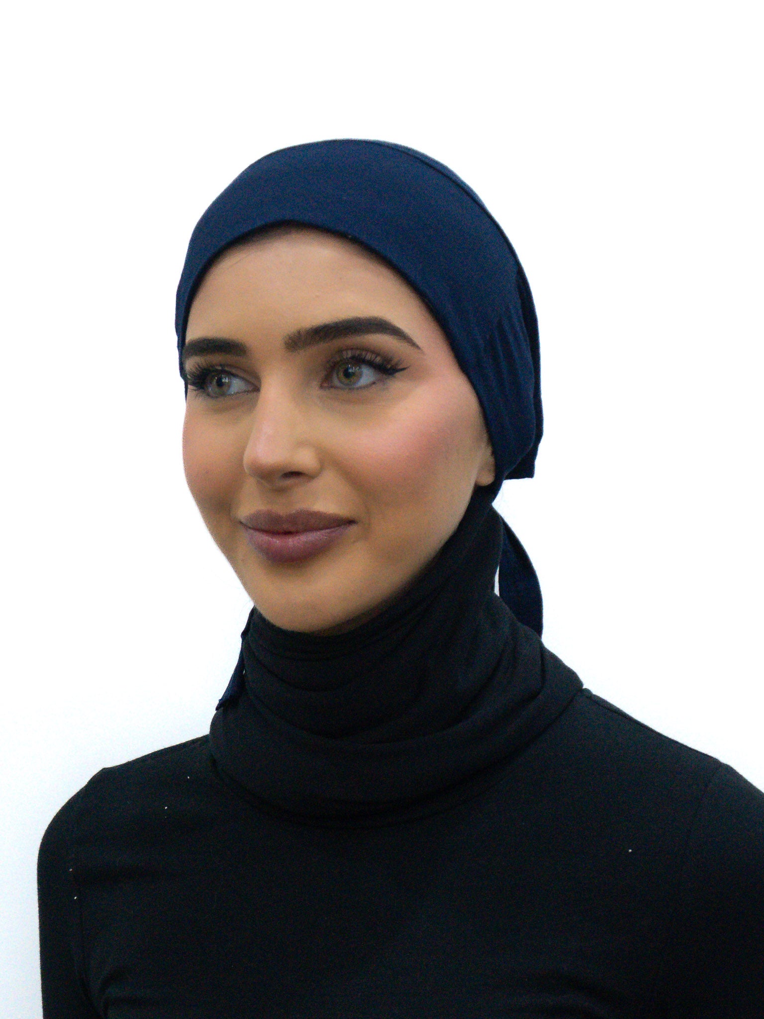 Tie Back Cap in navy colour, featuring an adjustable strap at the back for a comfortable fit.