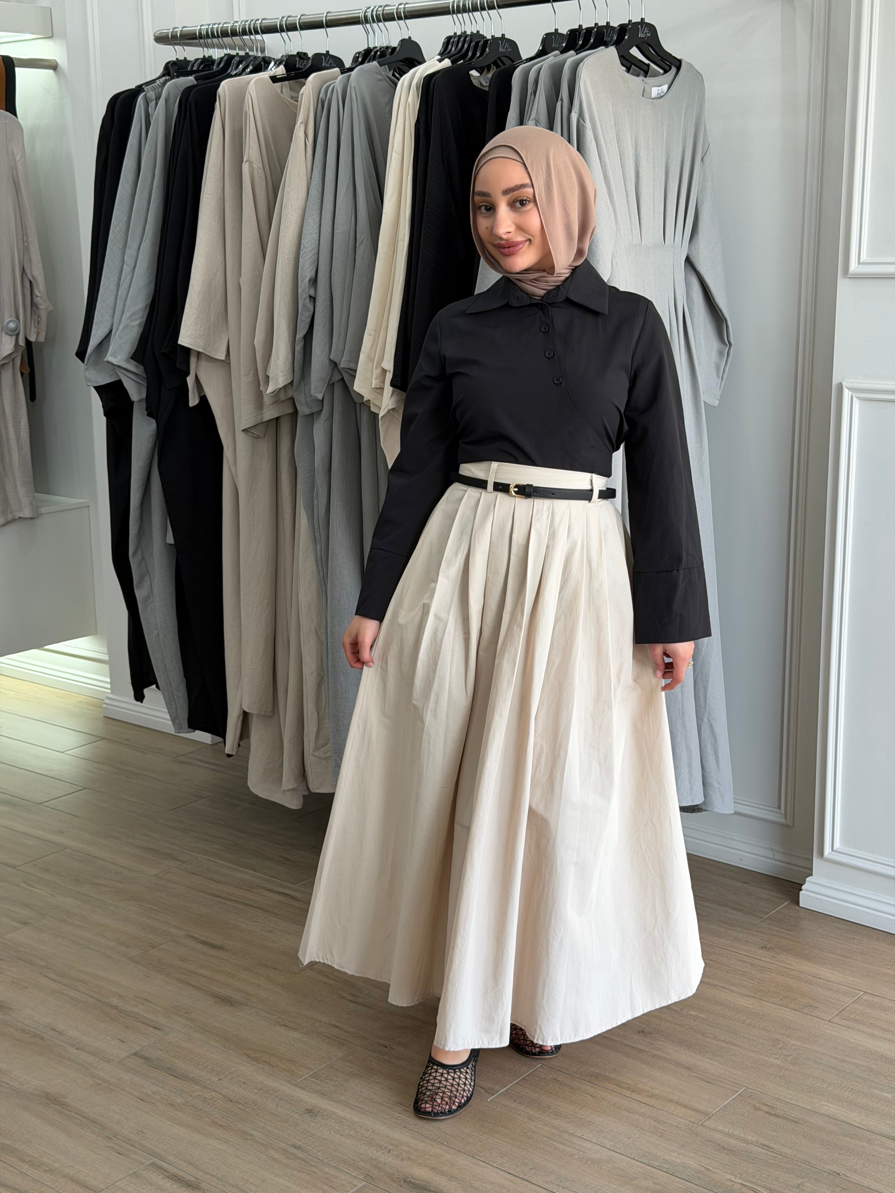 Amara flow skirt styled with a modest top for an effortless everyday look.