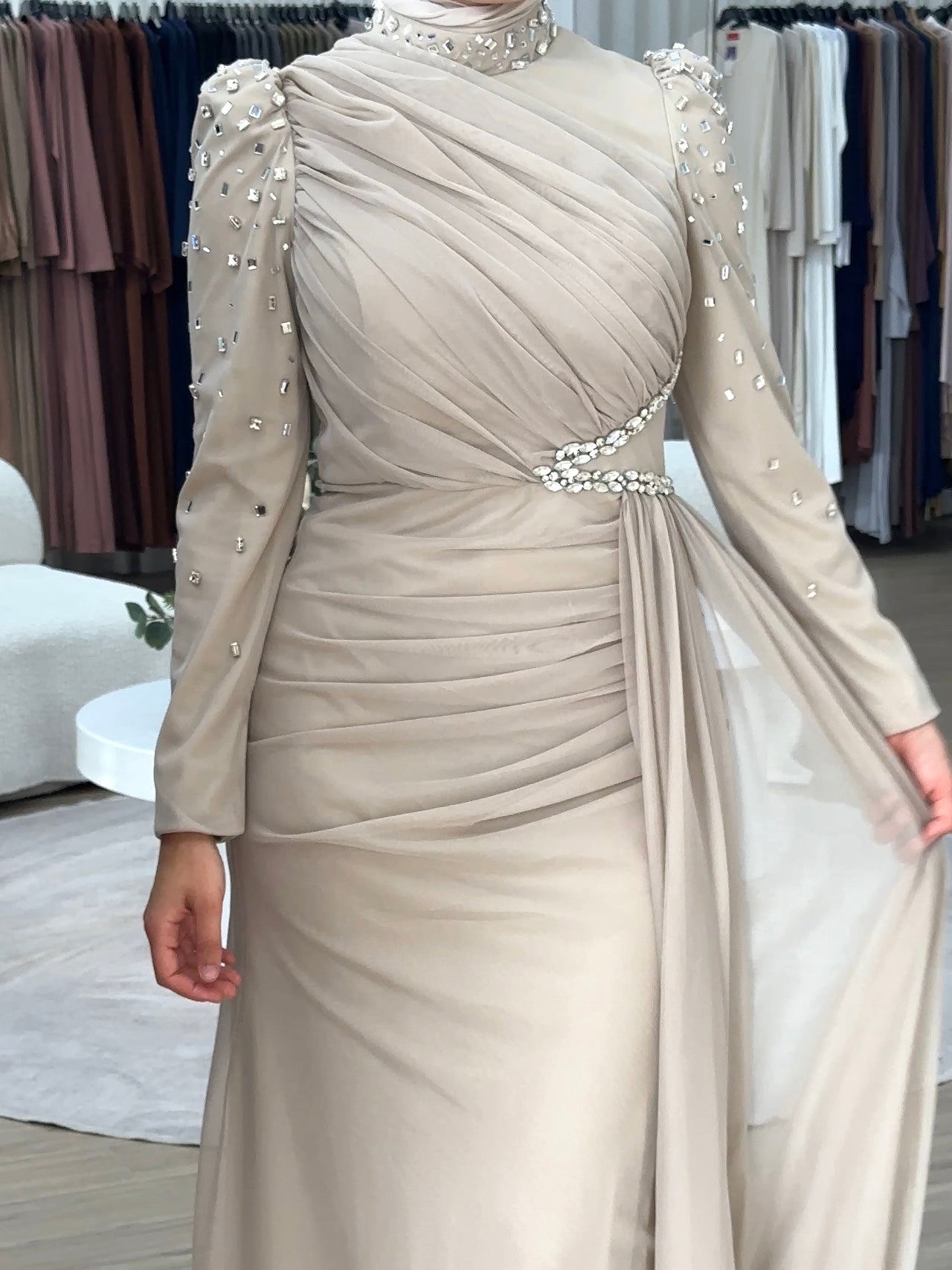 Women's modest formal dress in nude for any occasion, party, engagement, wedding event. long sleeve, full length maxi dress with embellishments and tulle fabrication for hijabi modest fashion