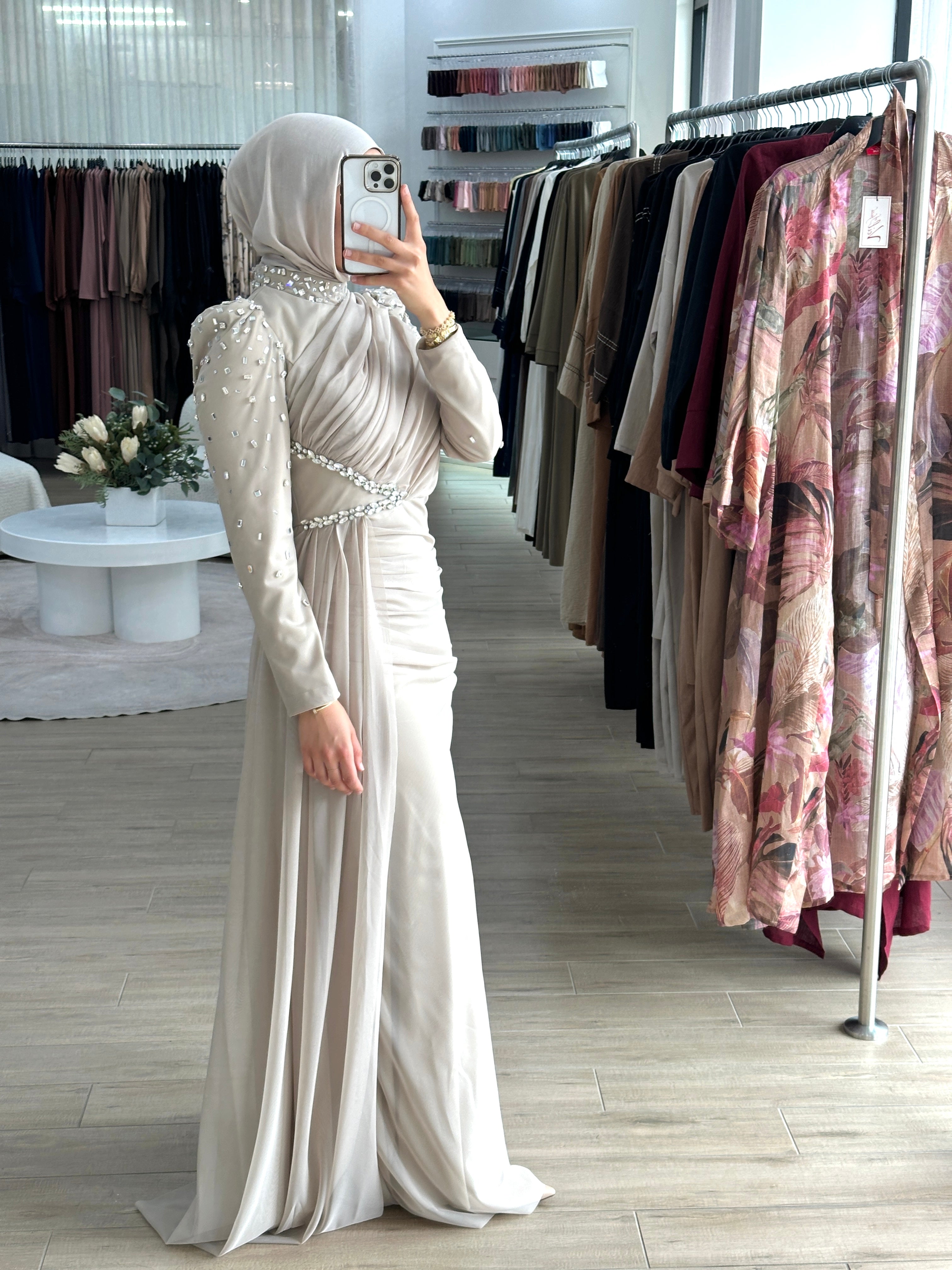 Women's modest formal dress in nude for any occasion, party, engagement, wedding event. long sleeve, full length maxi dress with embellishments and tulle fabrication for hijabi modest fashion