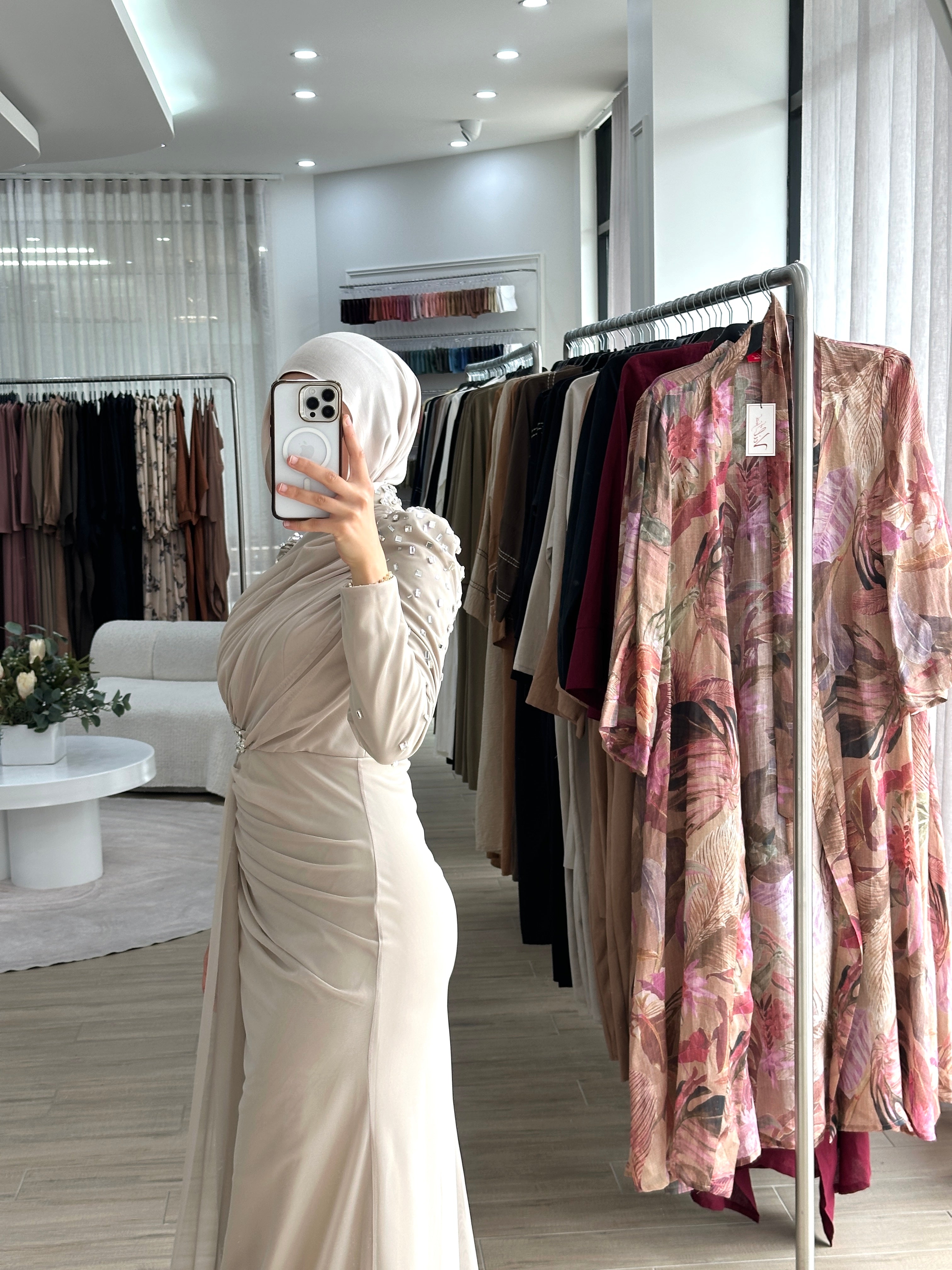 Women's modest formal dress in nude for any occasion, party, engagement, wedding event. long sleeve, full length maxi dress with embellishments and tulle fabrication for hijabi modest fashion