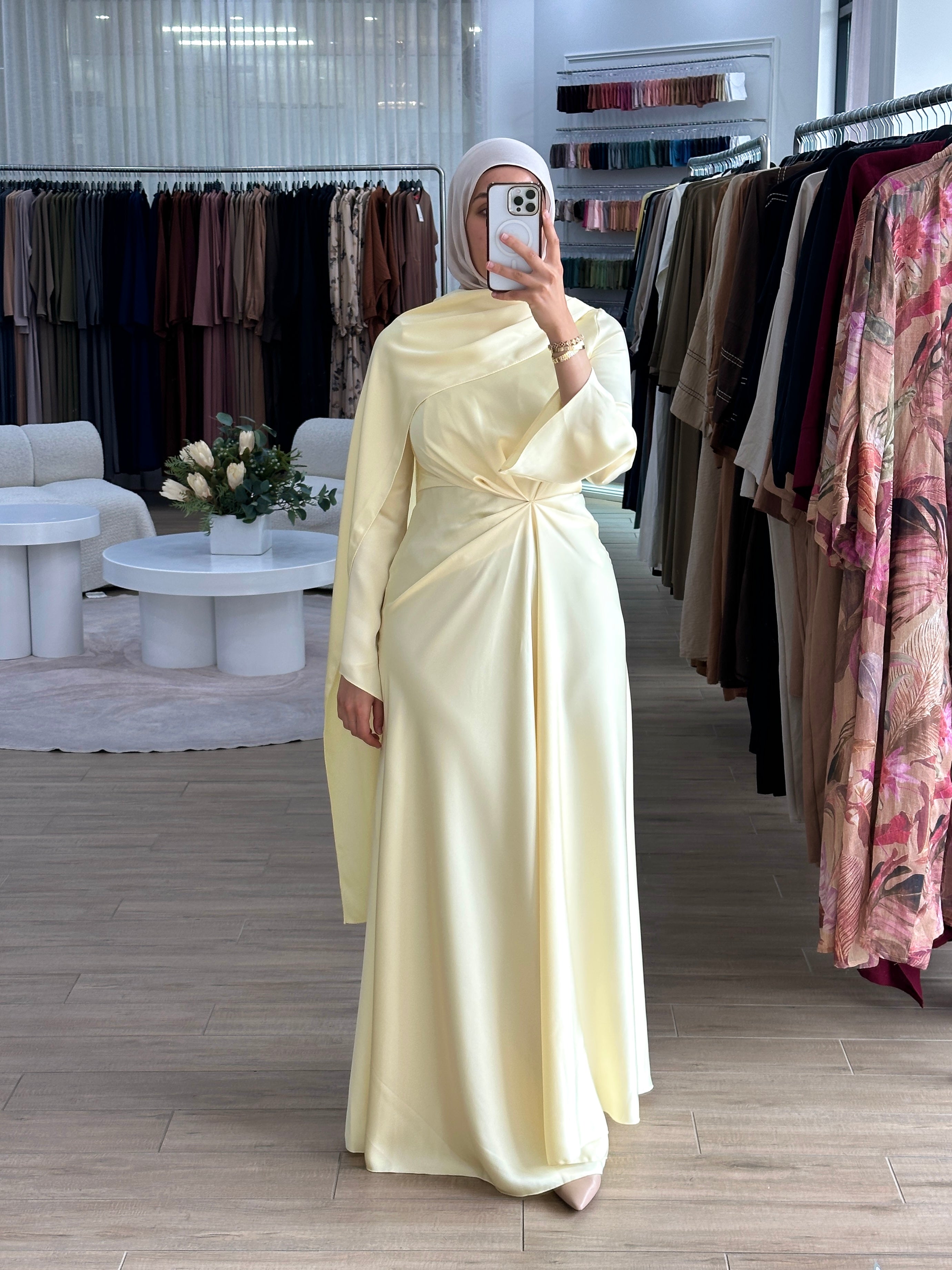 women's yellow formal dress in satin with long sleeves and full length, maxi for modest fashion and hijabis. suitable for formals, engagement, weddings, parties and any occasion.