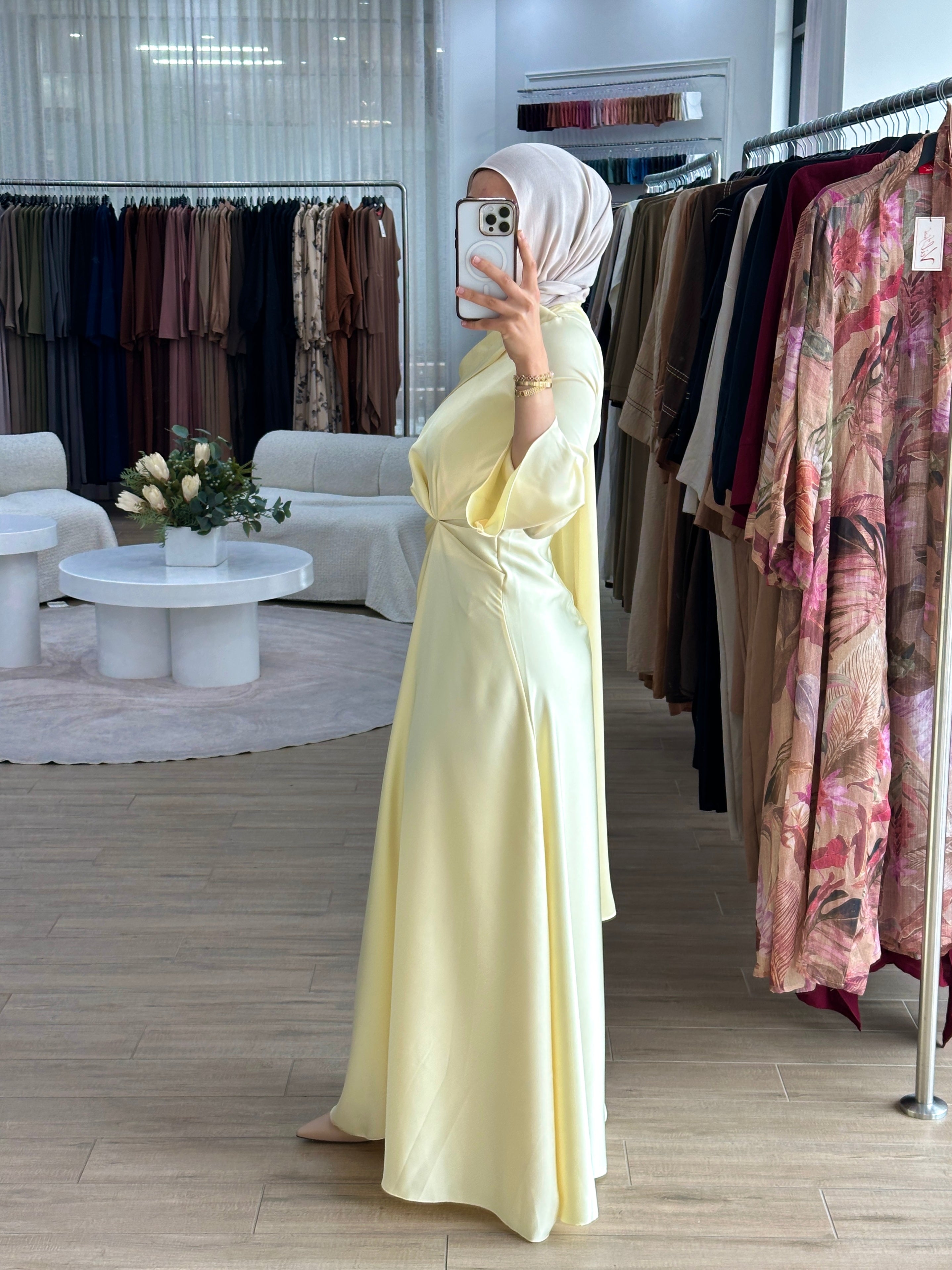 women's yellow formal dress in satin with long sleeves and full length, maxi for modest fashion and hijabis. suitable for formals, engagement, weddings, parties and any occasion.