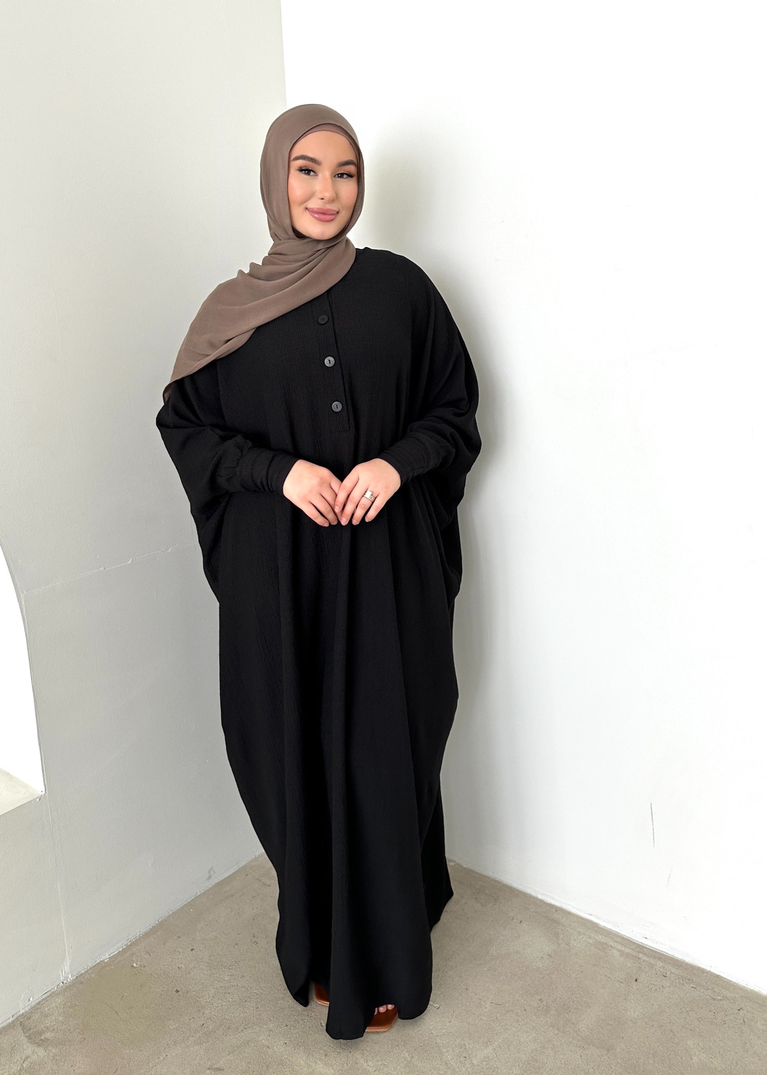women's oversize abaya, maxi dress with long sleeves and full length, lightweight with buttons and modest for all seasons.