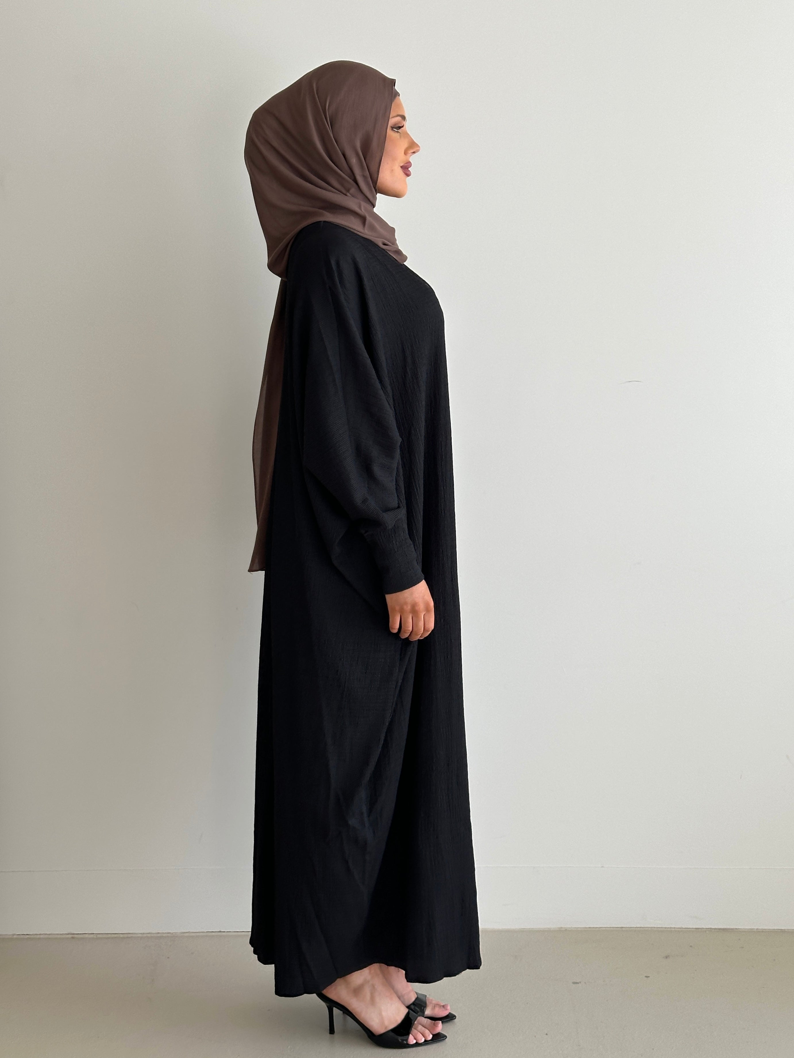 women's oversize abaya, maxi dress with long sleeves and full length, lightweight with buttons and modest for all seasons.