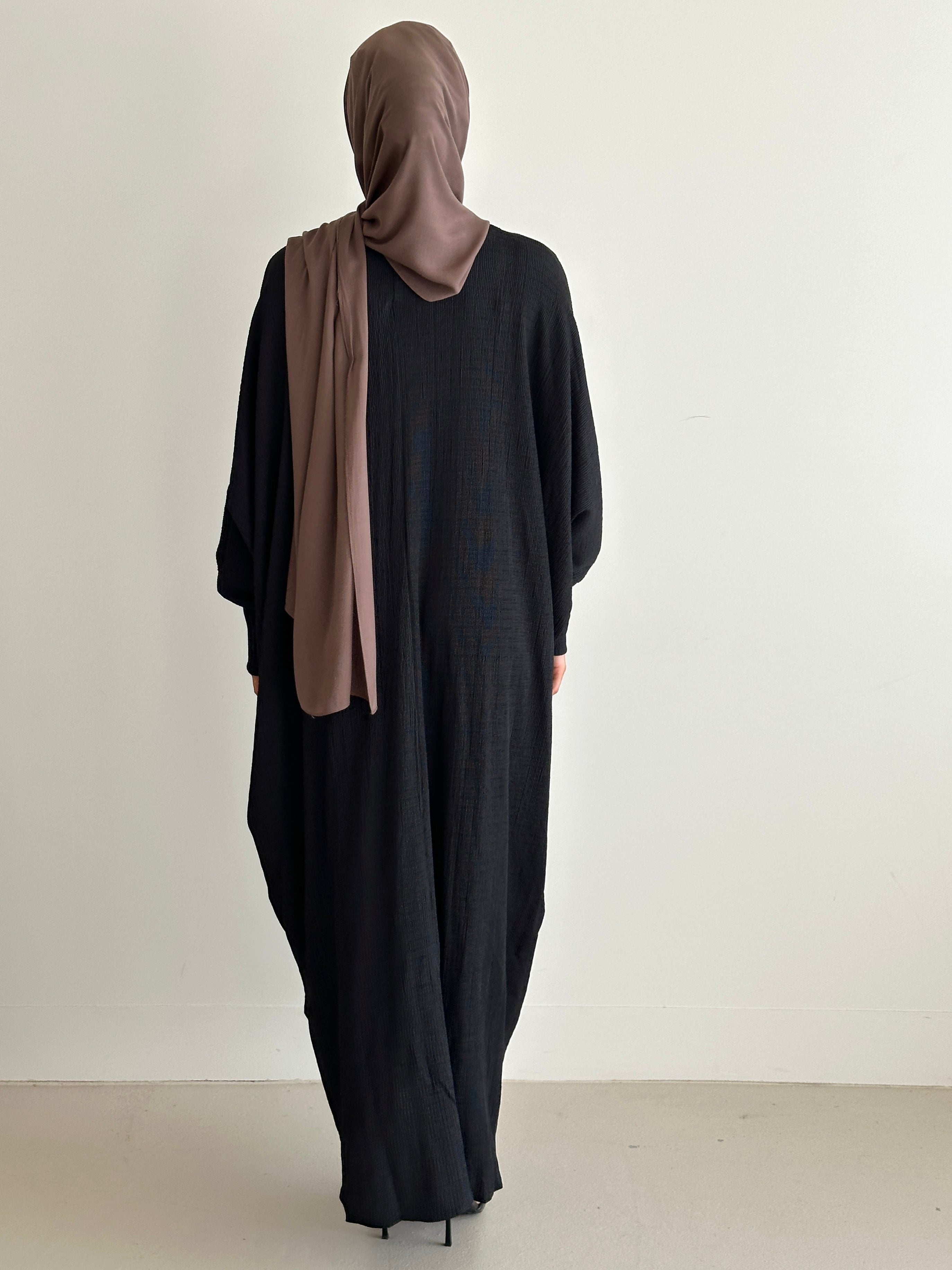 women's oversize abaya, maxi dress with long sleeves and full length, lightweight with buttons and modest for all seasons.