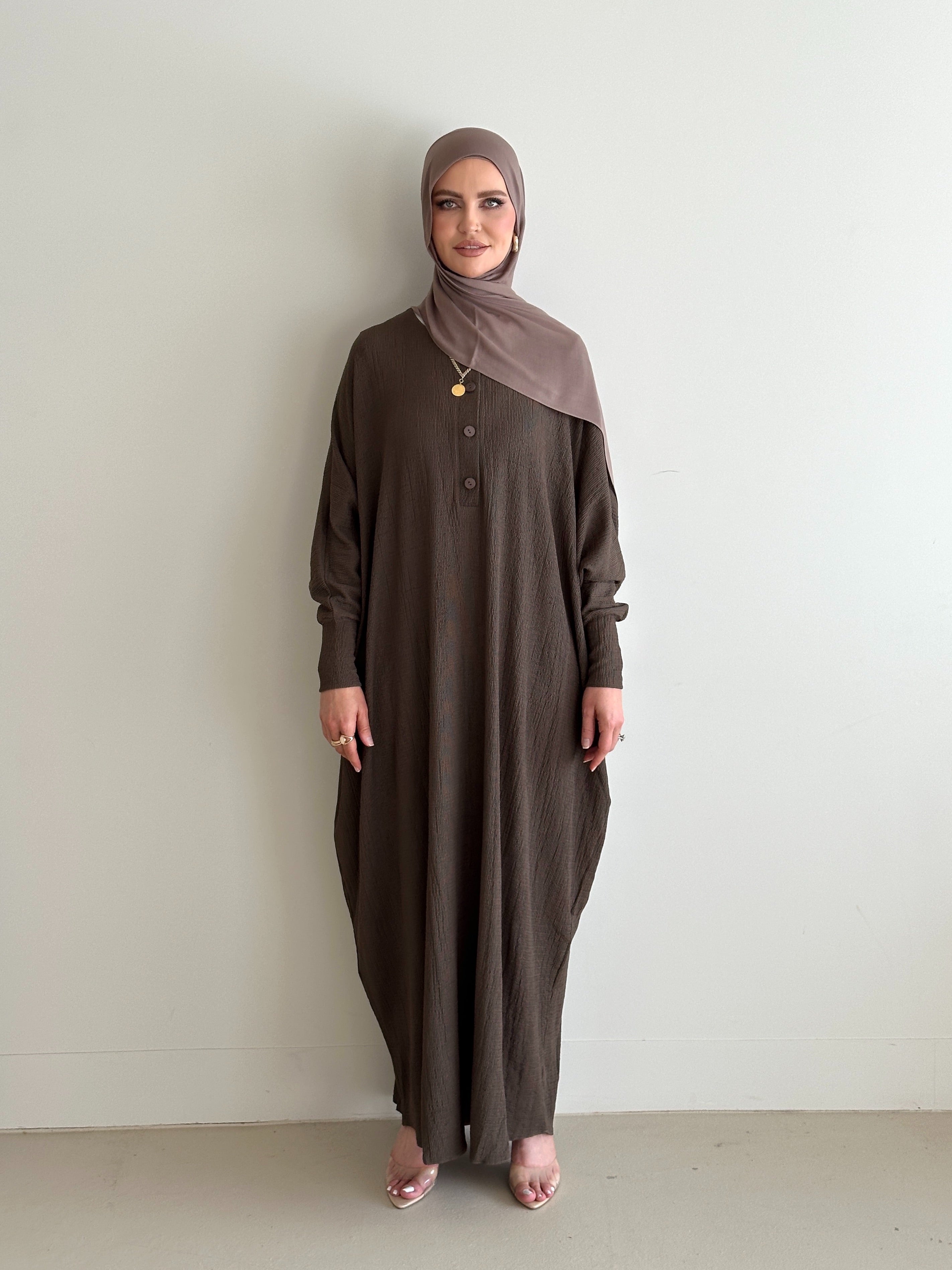 women's oversize abaya, maxi dress with long sleeves and full length, lightweight with buttons and modest for all seasons.