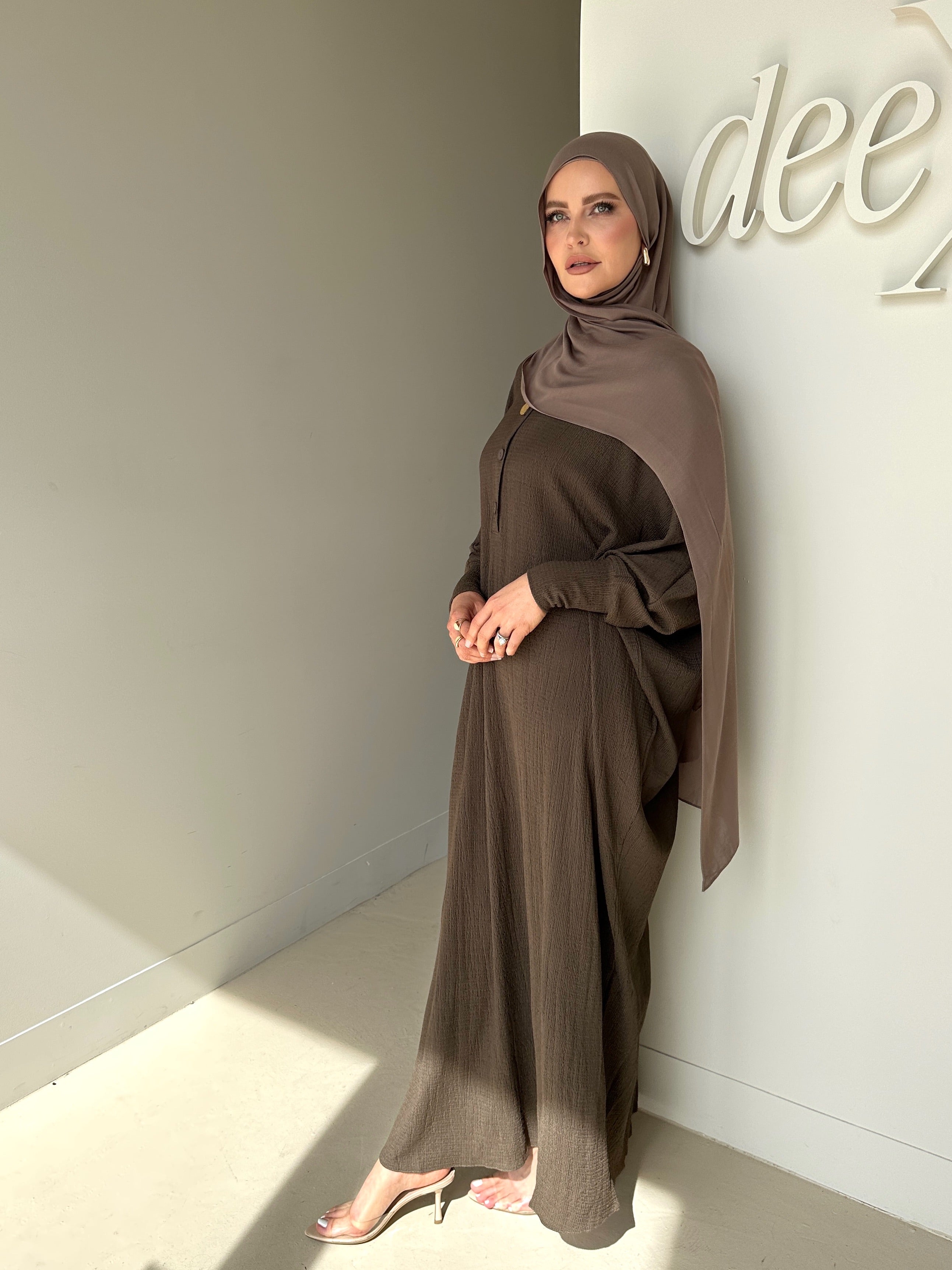women's oversize abaya, maxi dress with long sleeves and full length, lightweight with buttons and modest for all seasons.