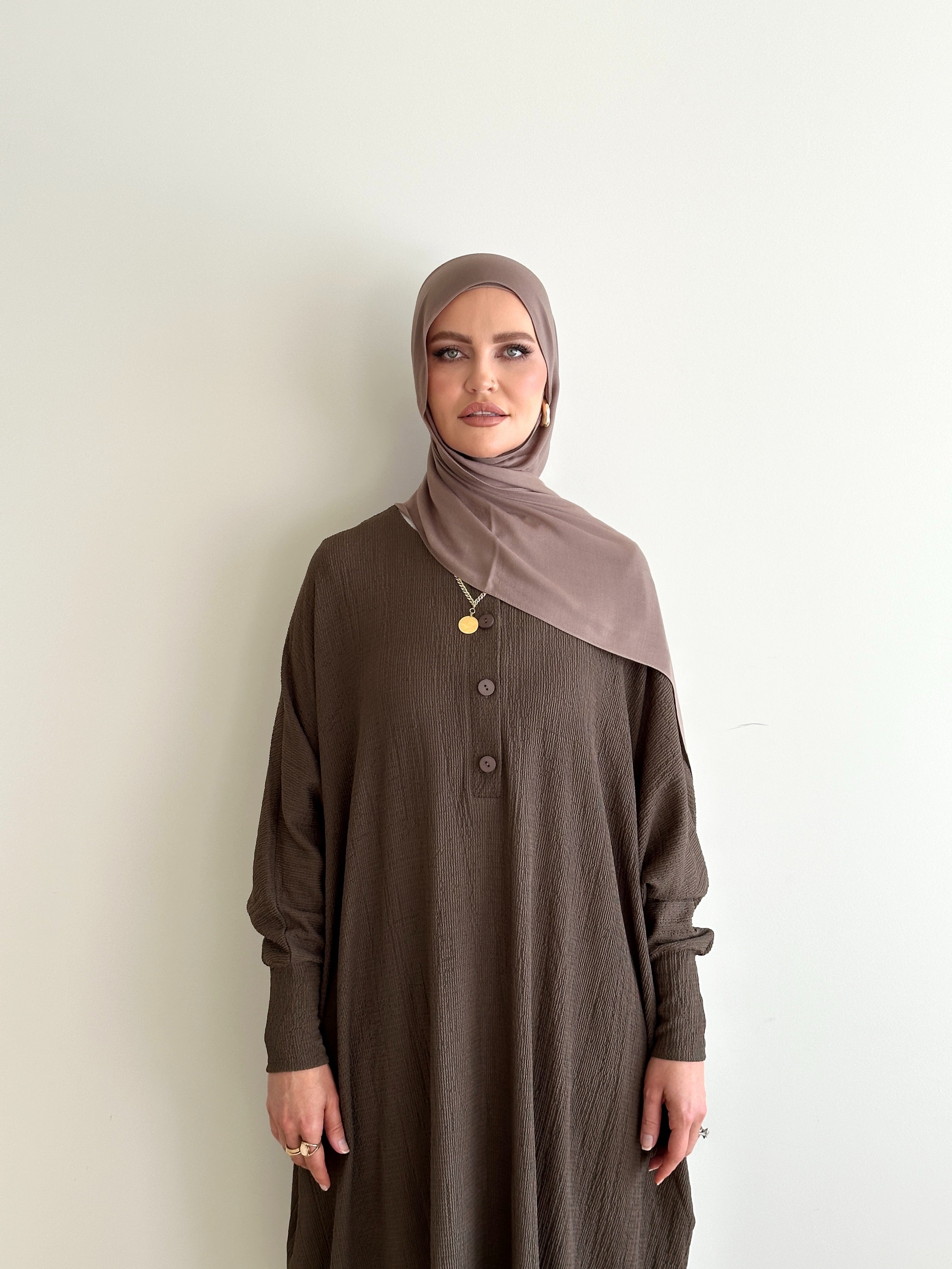 women's oversize abaya, maxi dress with long sleeves and full length, lightweight with buttons and modest for all seasons.