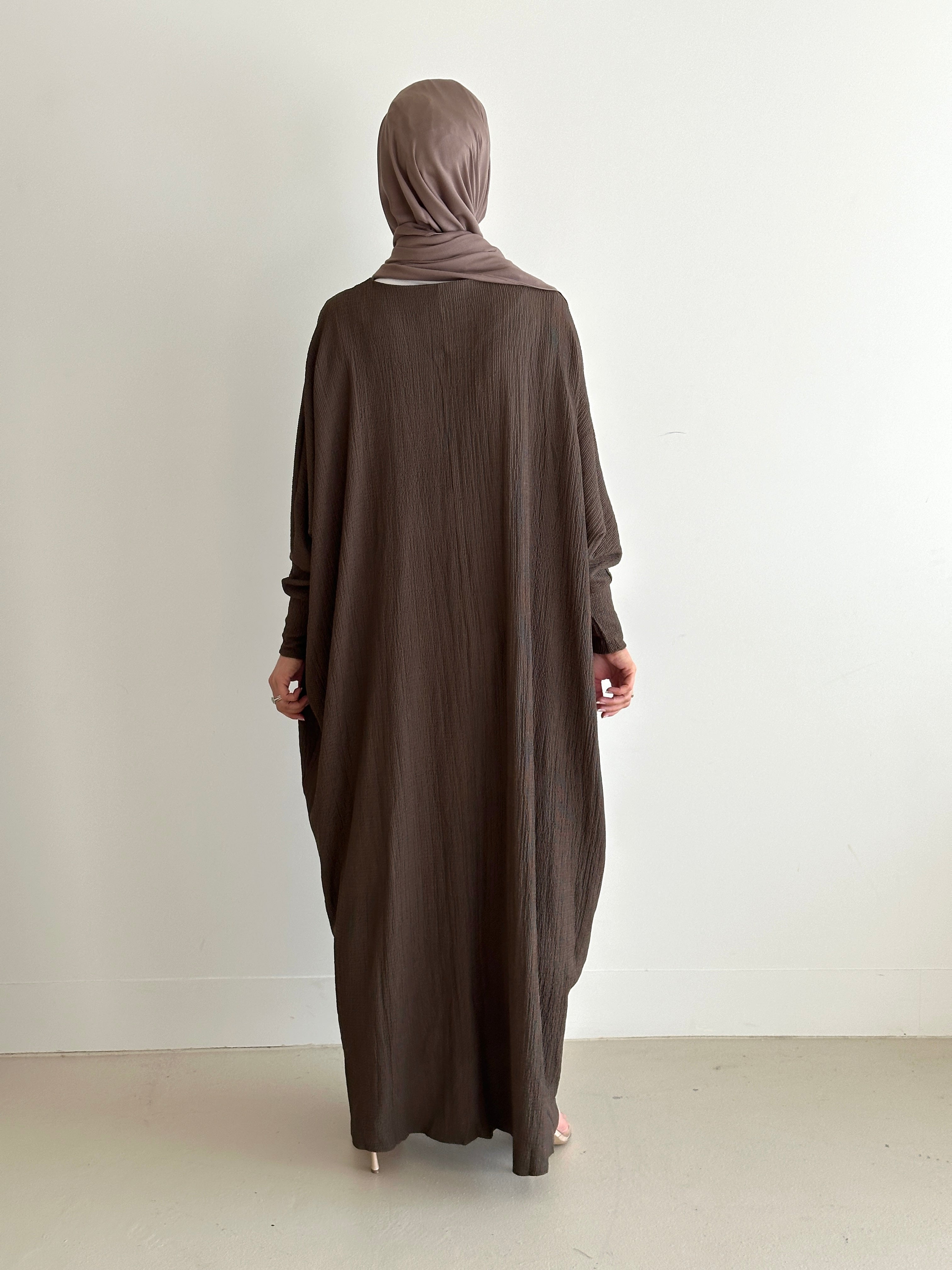 women's oversize abaya, maxi dress with long sleeves and full length, lightweight with buttons and modest for all seasons.