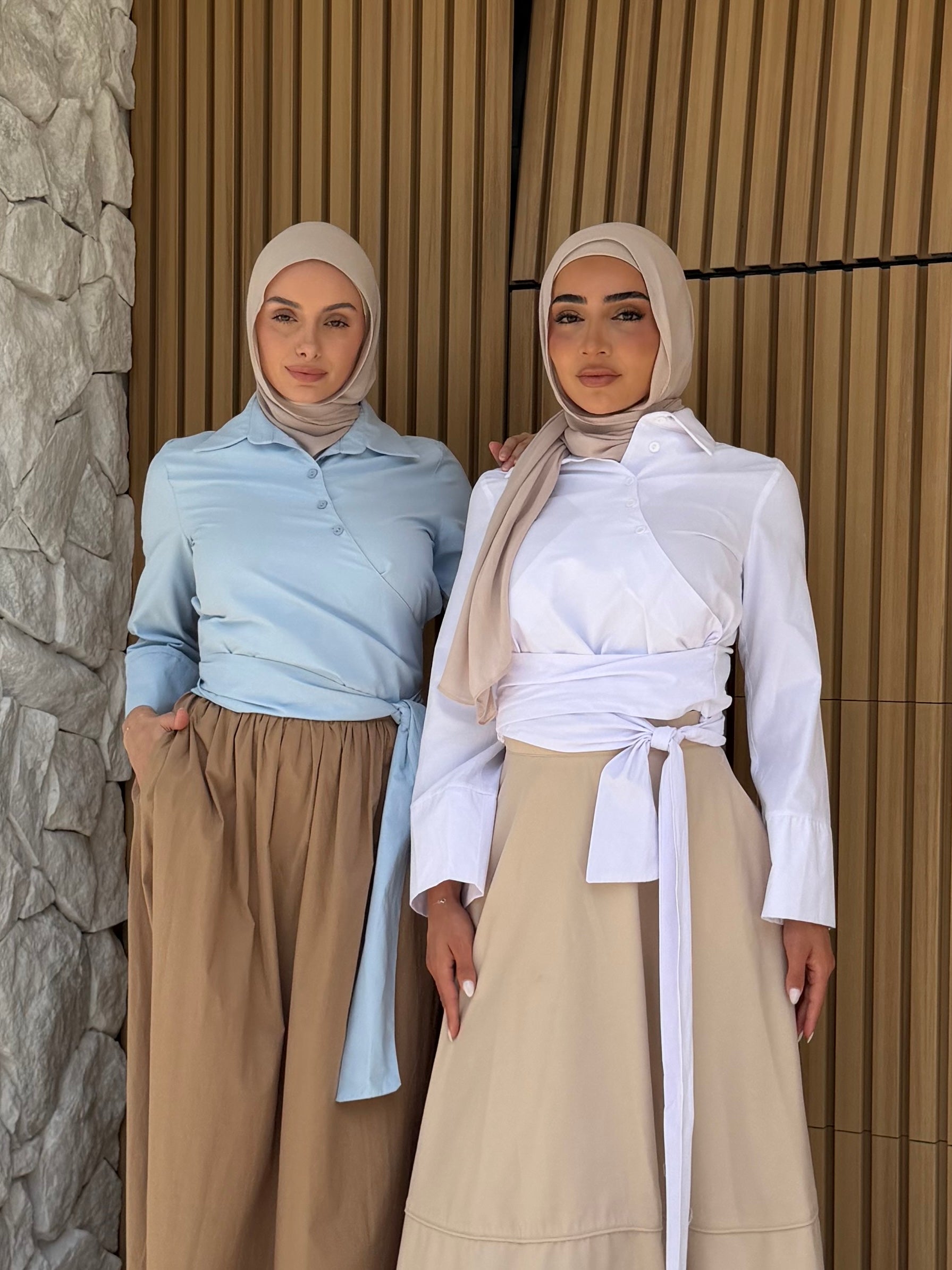 women's button wrap shirt with tie, collar and long sleeves in baby blue and white. top for hijabi friendly, modest fashion.