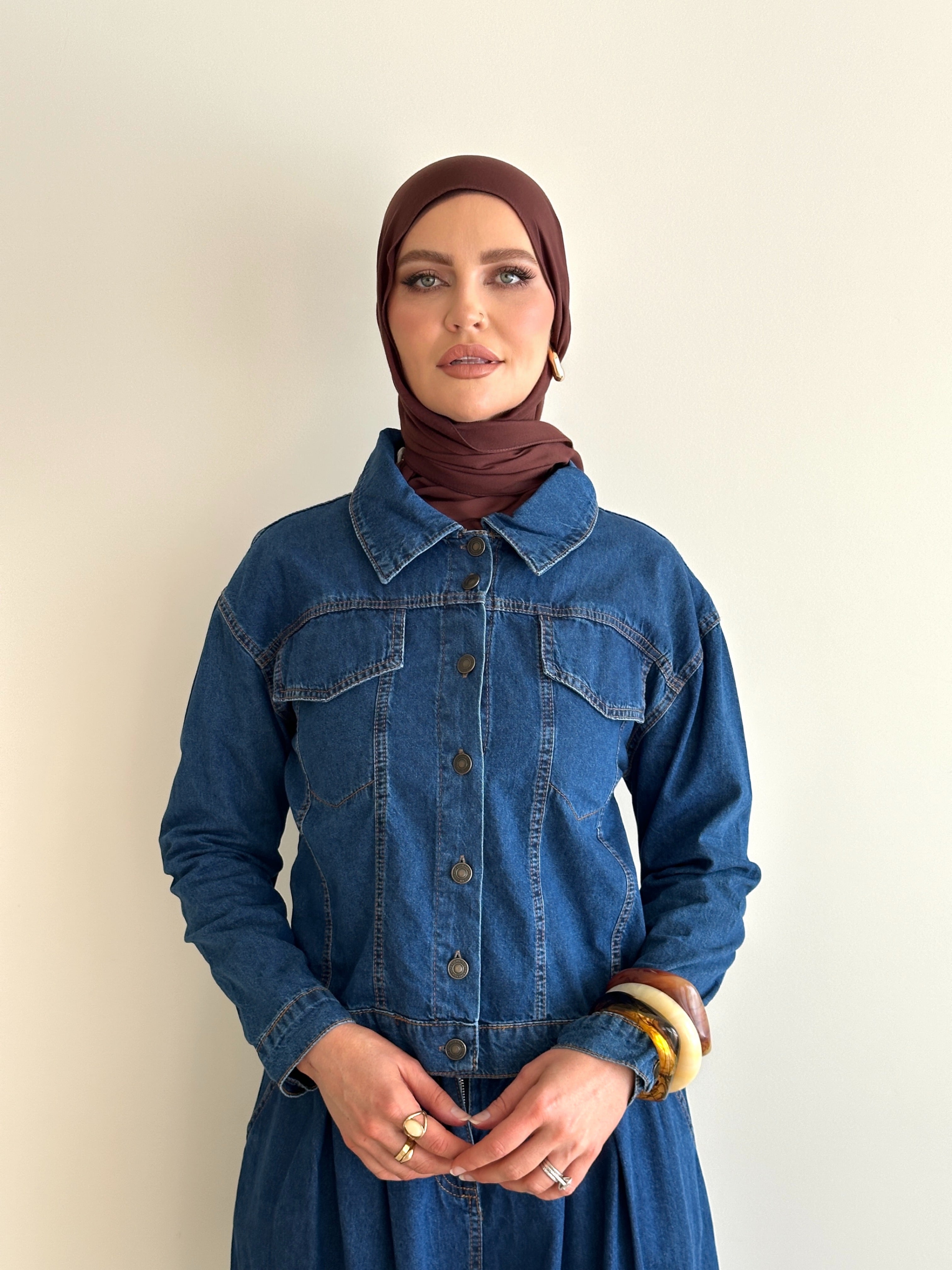 women wearing matching cargo denim jacket and skirt co-ord set for spring/summer modest fashion