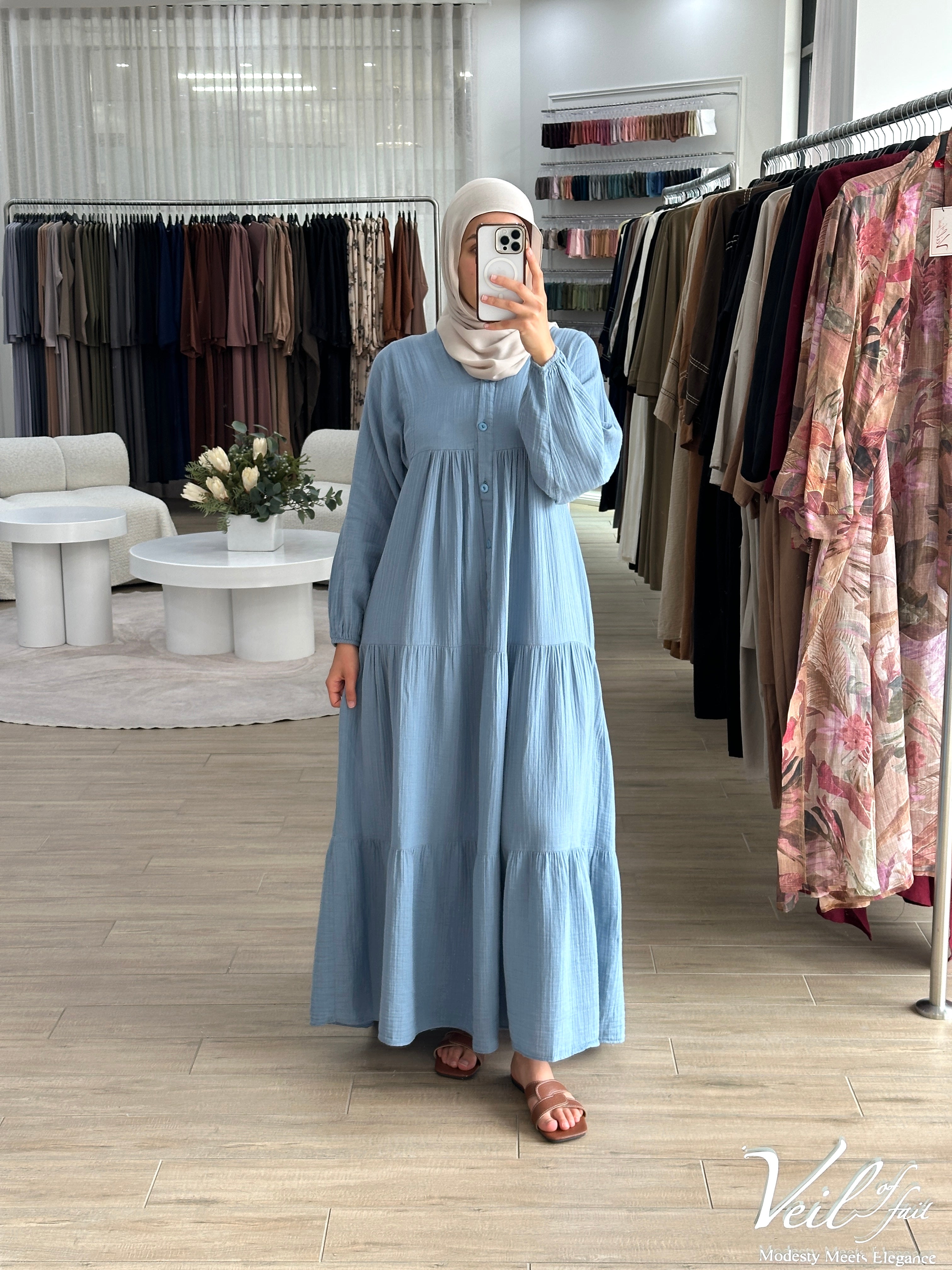 women's maxi full length dress that is made from cotton, it's lightweight and breathable and has centre front buttons with long sleeves for the modest girls who wear hijab.