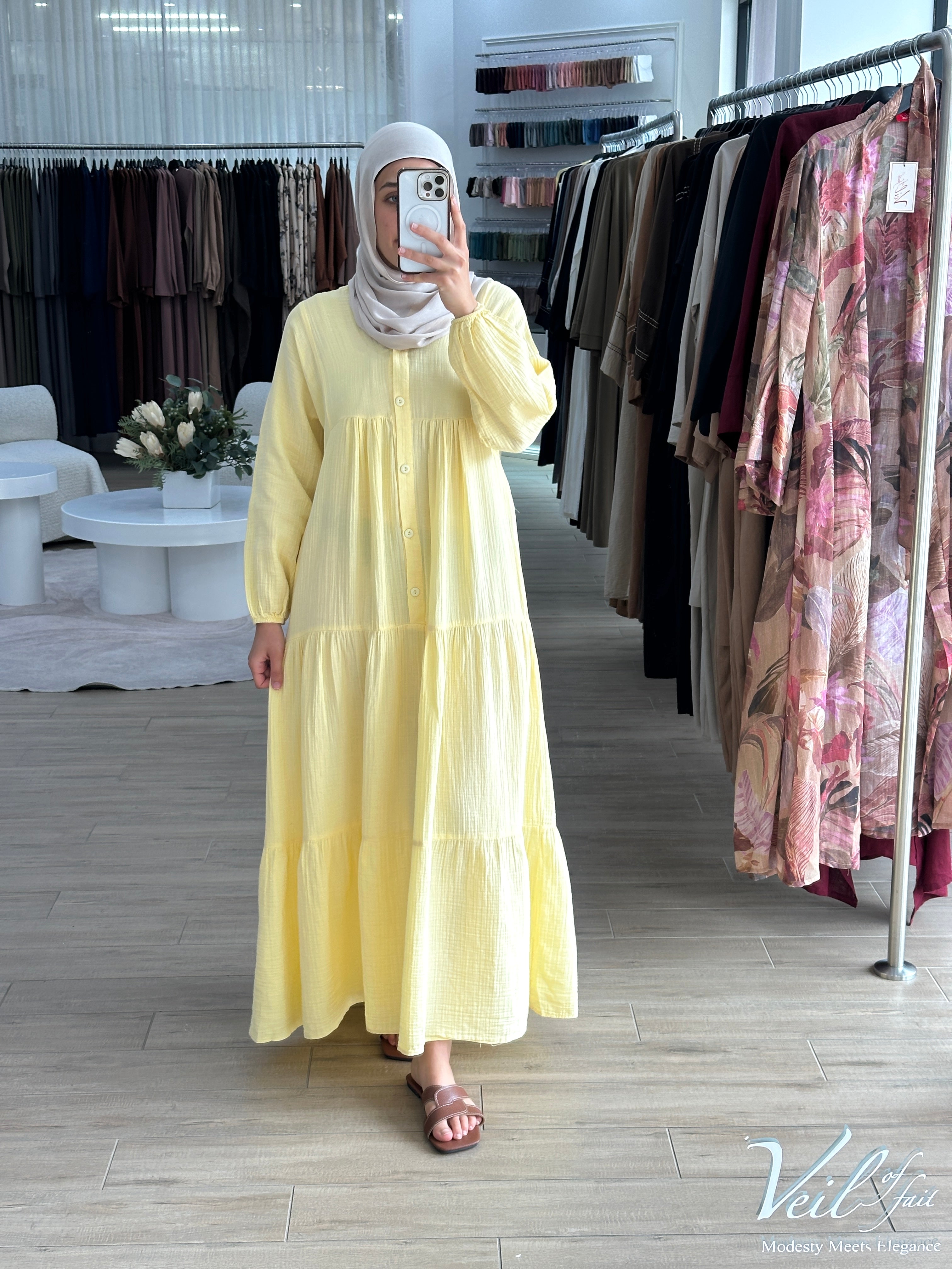 women's maxi full length dress that is made from cotton, it's lightweight and breathable and has centre front buttons with long sleeves for the modest girls who wear hijab.