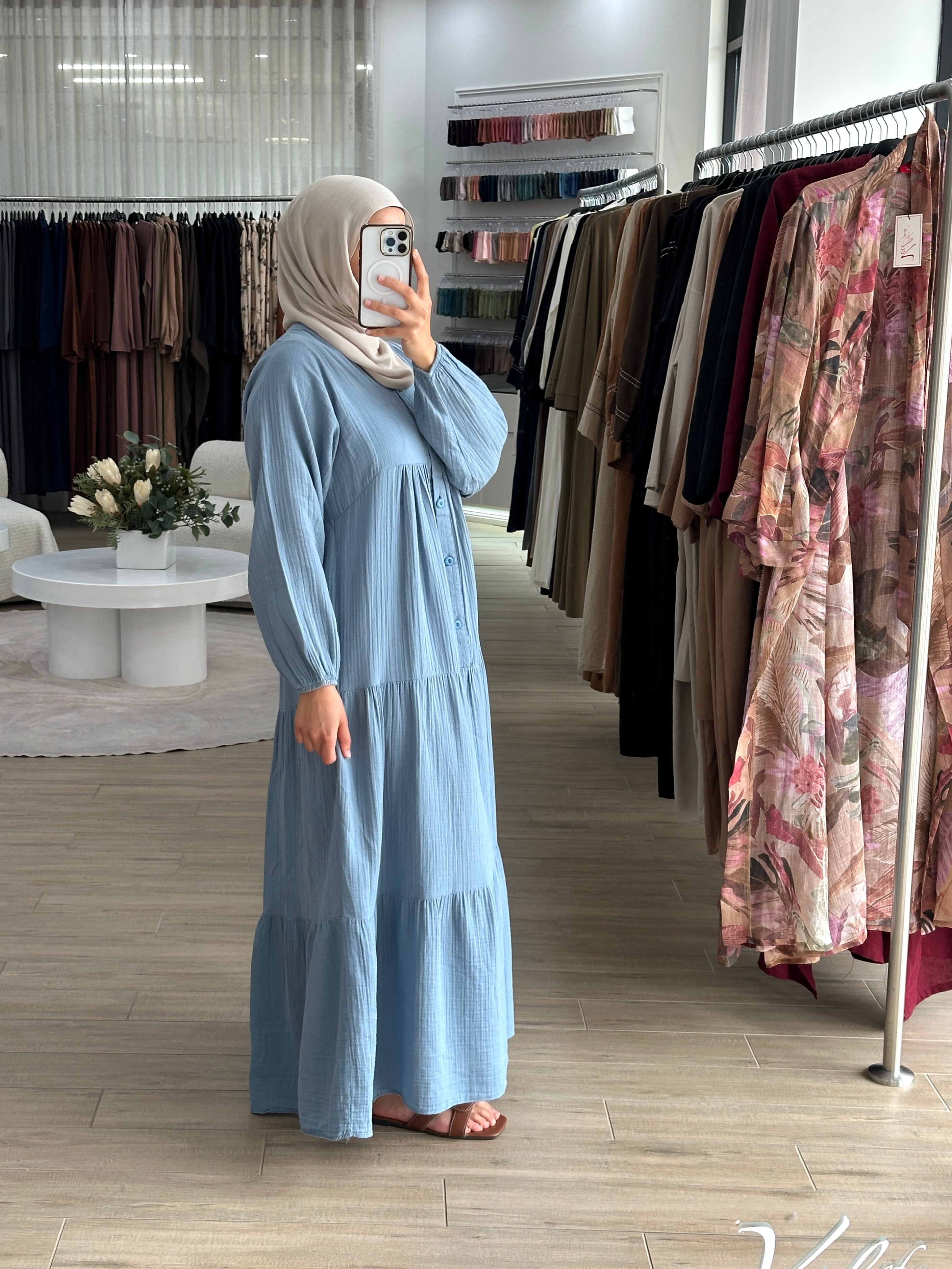 women's maxi full length dress that is made from cotton, it's lightweight and breathable and has centre front buttons with long sleeves for the modest girls who wear hijab.