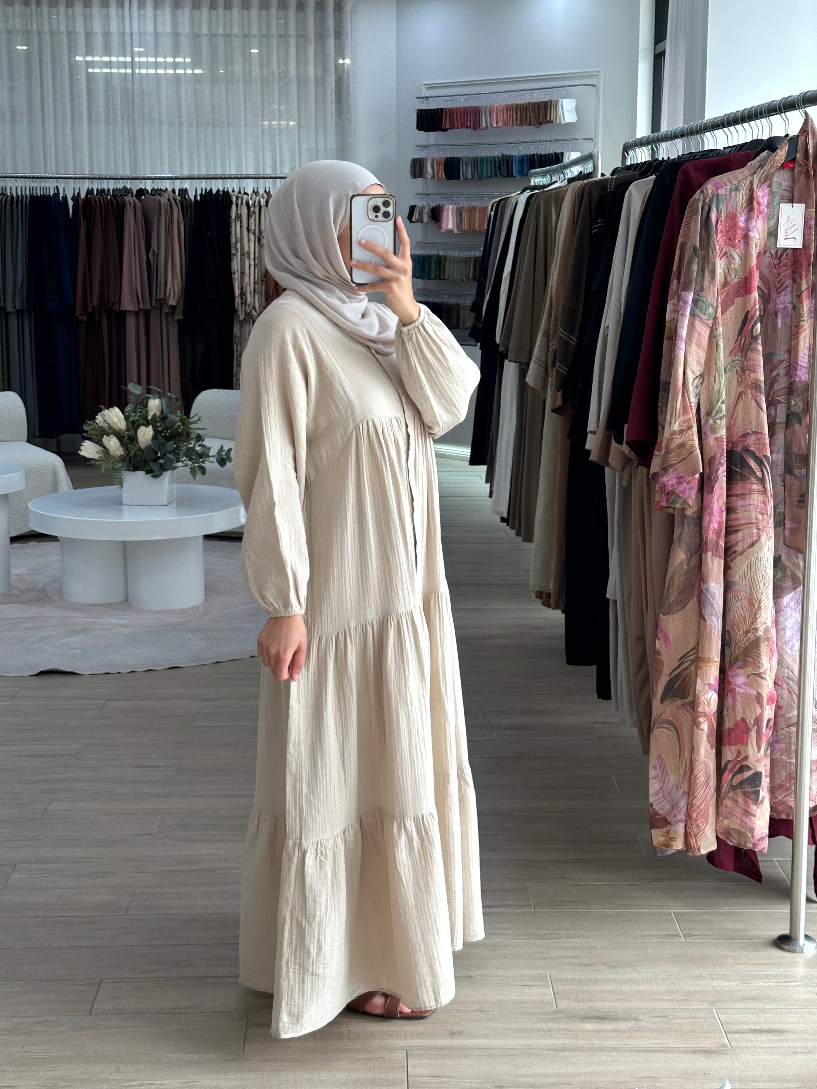 women's maxi full length dress that is made from cotton, it's lightweight and breathable and has centre front buttons with long sleeves for the modest girls who wear hijab.
