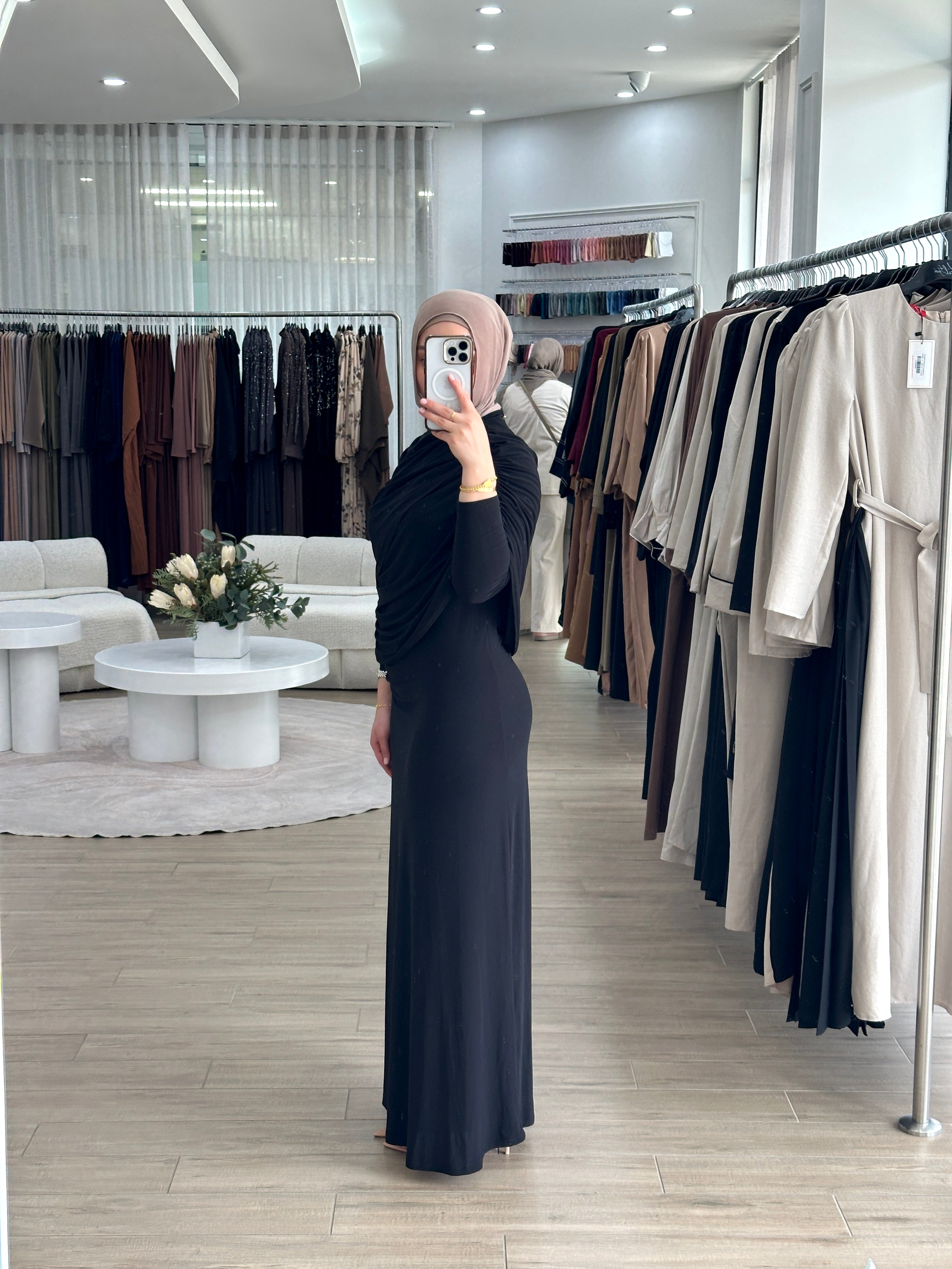 women's full length maxi formal dress in black, jersey fabrication with drape and ruching for parties, occasions, events, engagements, weddings. modest and lightweight with long sleeves.
